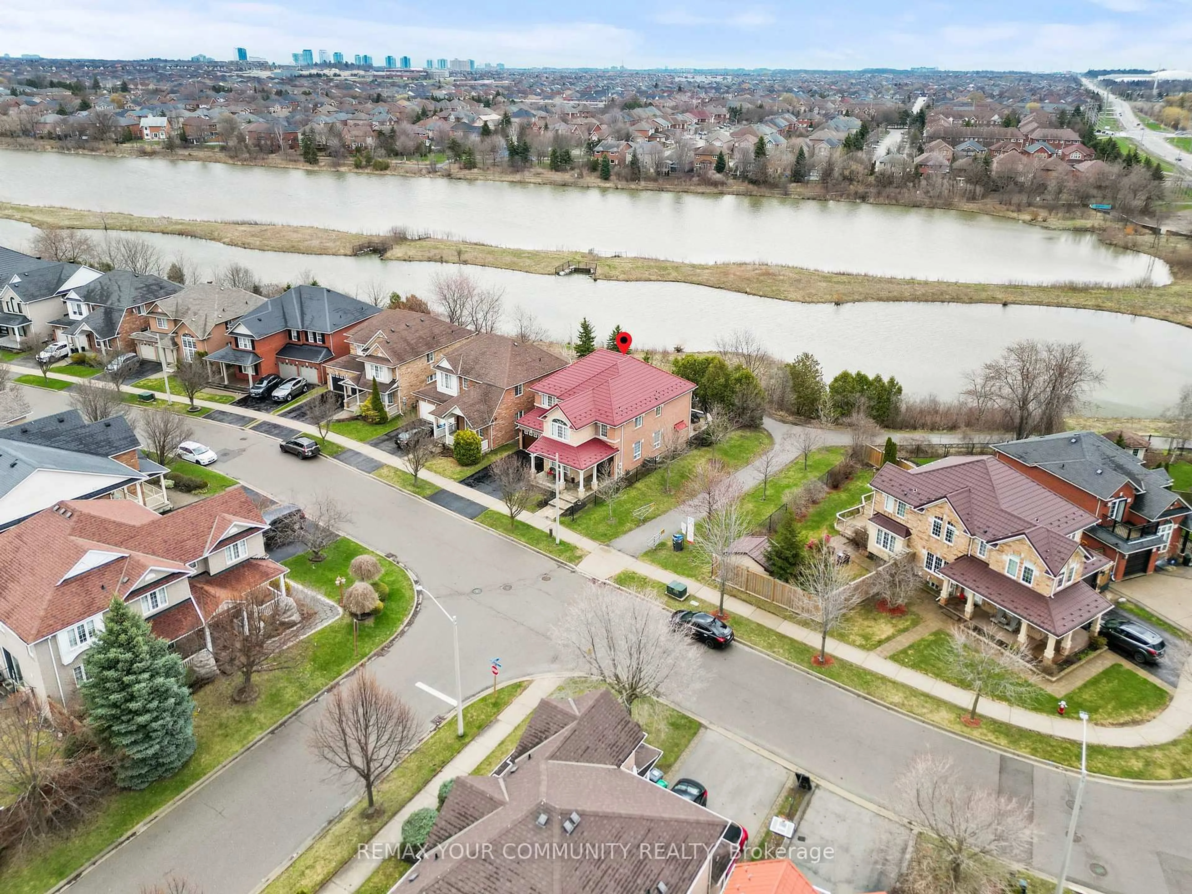 A pic from outside/outdoor area/front of a property/back of a property/a pic from drone, water/lake/river/ocean view for 3970 Pondview Way, Mississauga Ontario L5N 8J8