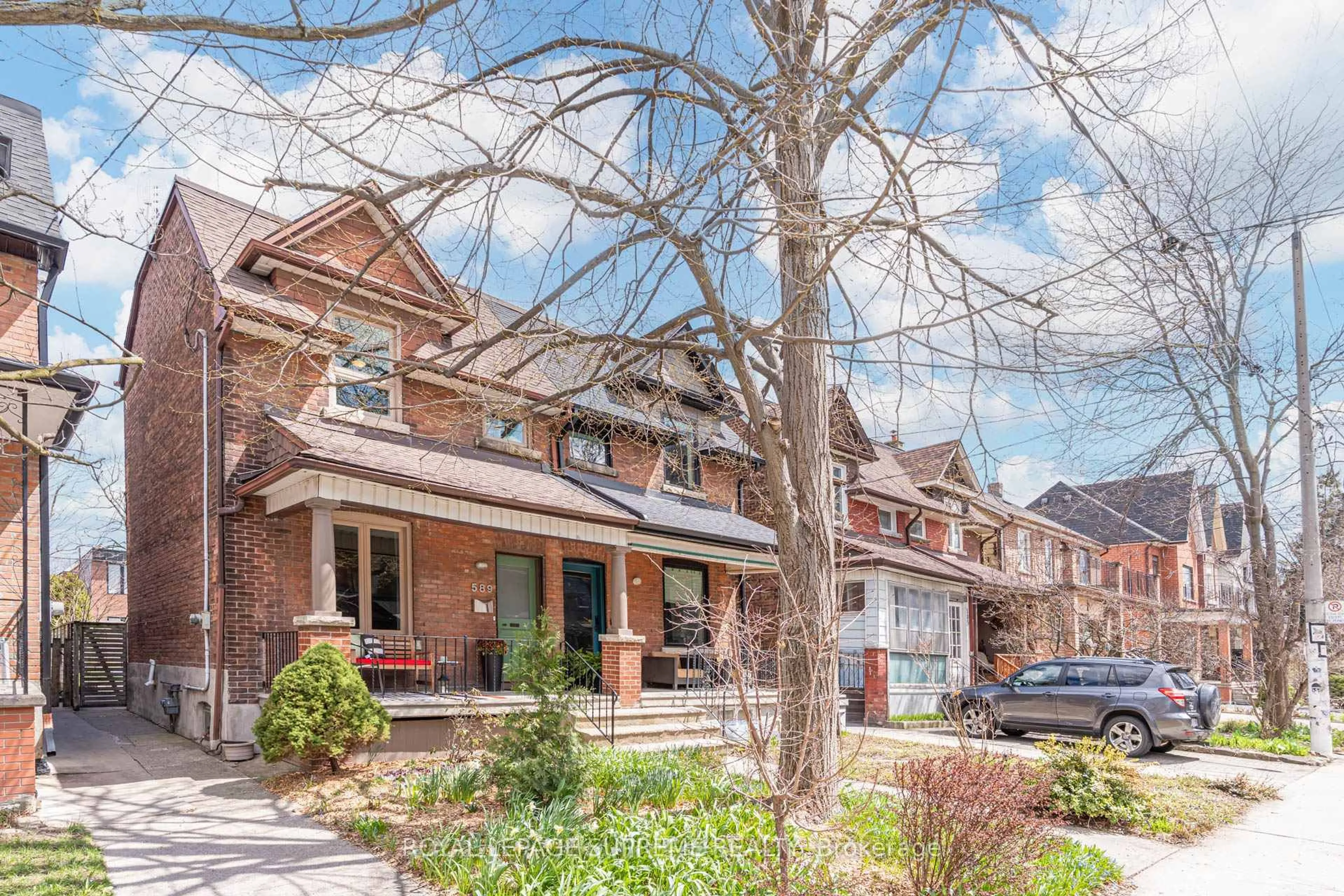 Home with brick exterior material, street for 589 Gladstone Ave, Toronto Ontario M6H 3J3
