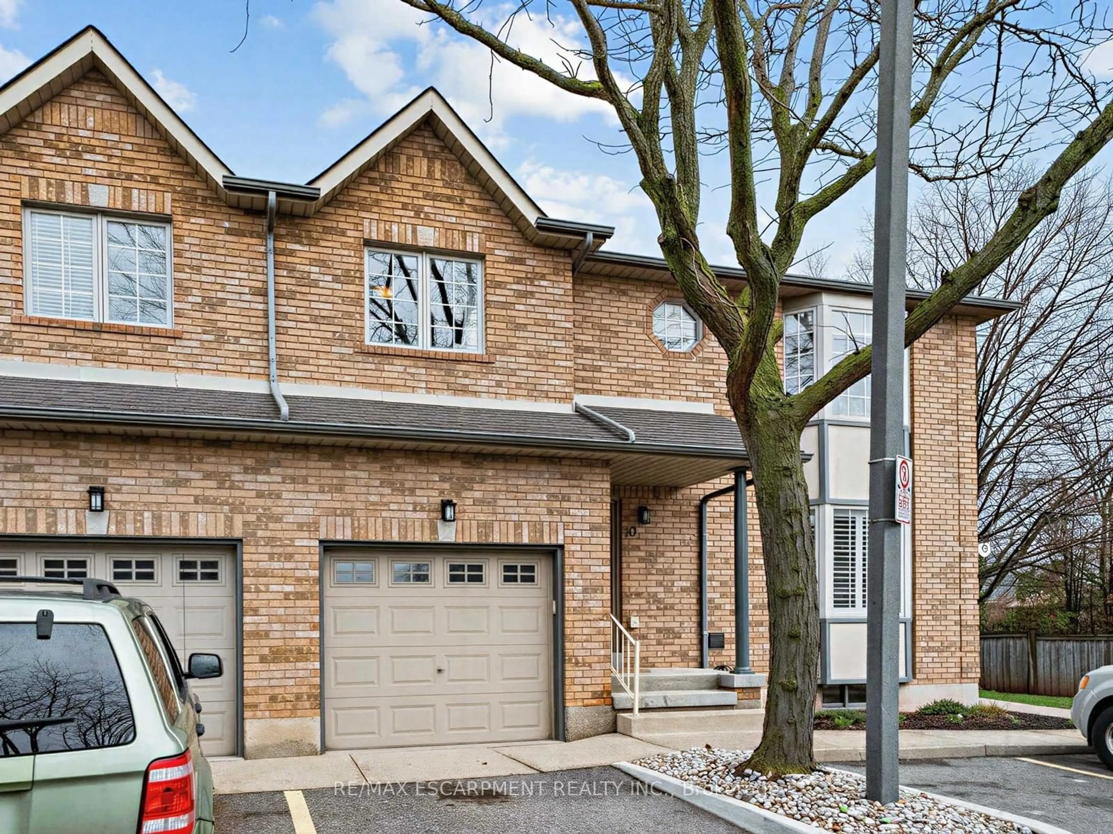 Home with brick exterior material, street for 705 CUMBERLAND Ave #10, Burlington Ontario L7N 3W4
