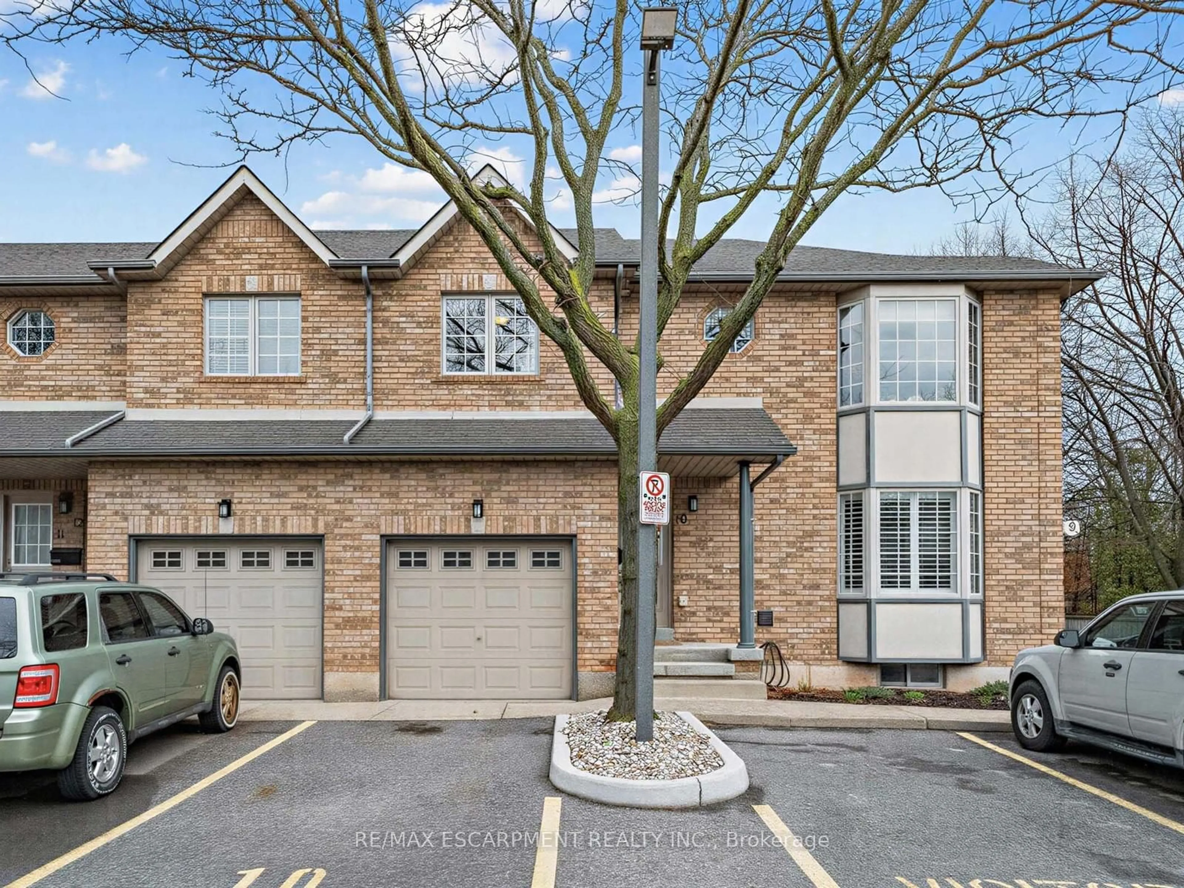 Home with brick exterior material, street for 705 CUMBERLAND Ave #10, Burlington Ontario L7N 3W4