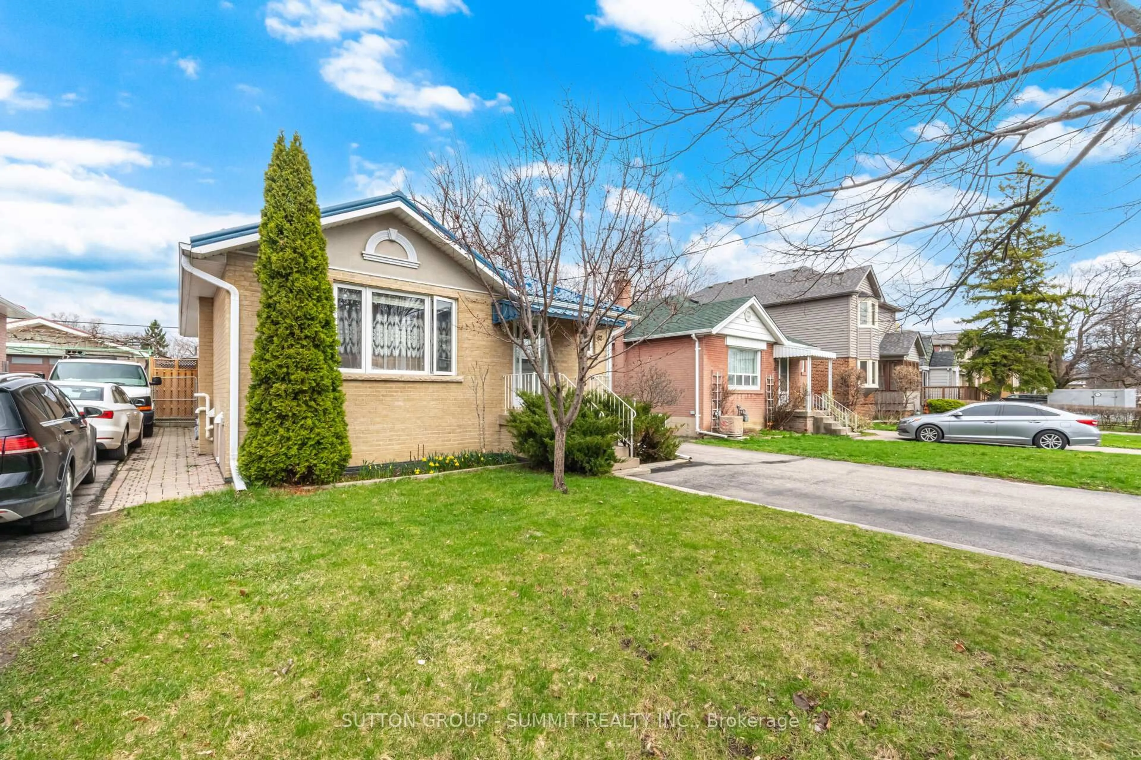 Home with vinyl exterior material, street for 82 MacDonald St, Toronto Ontario M8V 1Y4