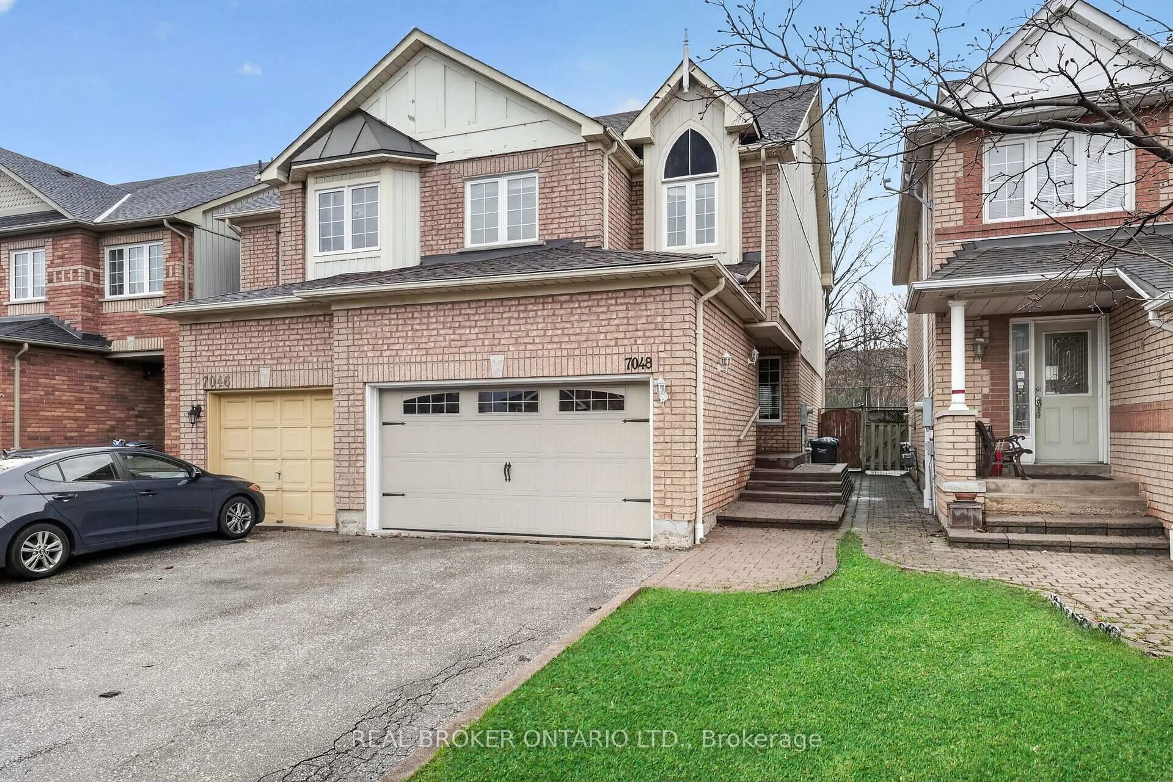 Home with brick exterior material, street for 7048 Frontier Rdge, Mississauga Ontario L5N 7R6