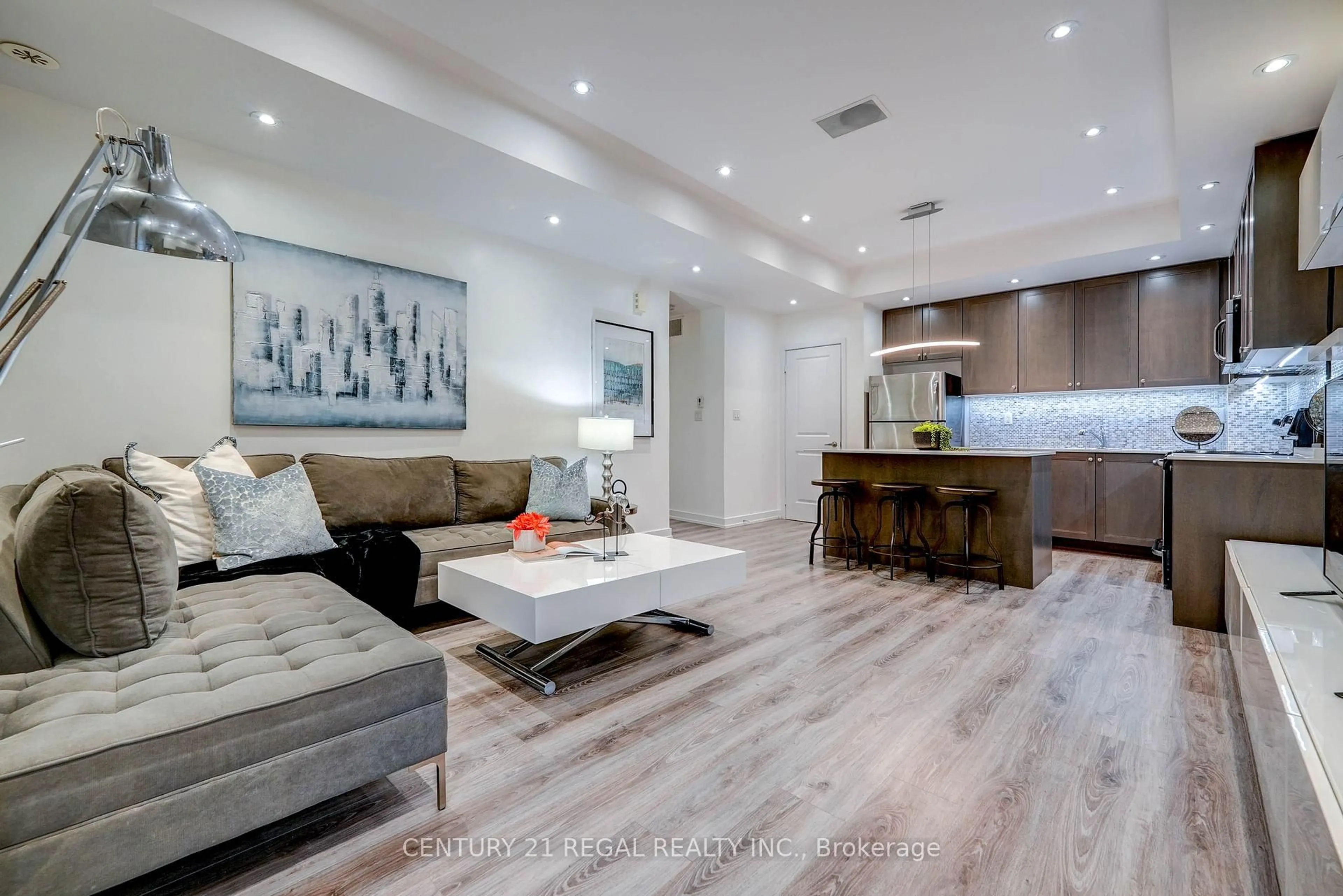 Living room with furniture, wood/laminate floor for 867 Wilson Ave #5B, Toronto Ontario M3K 0A4