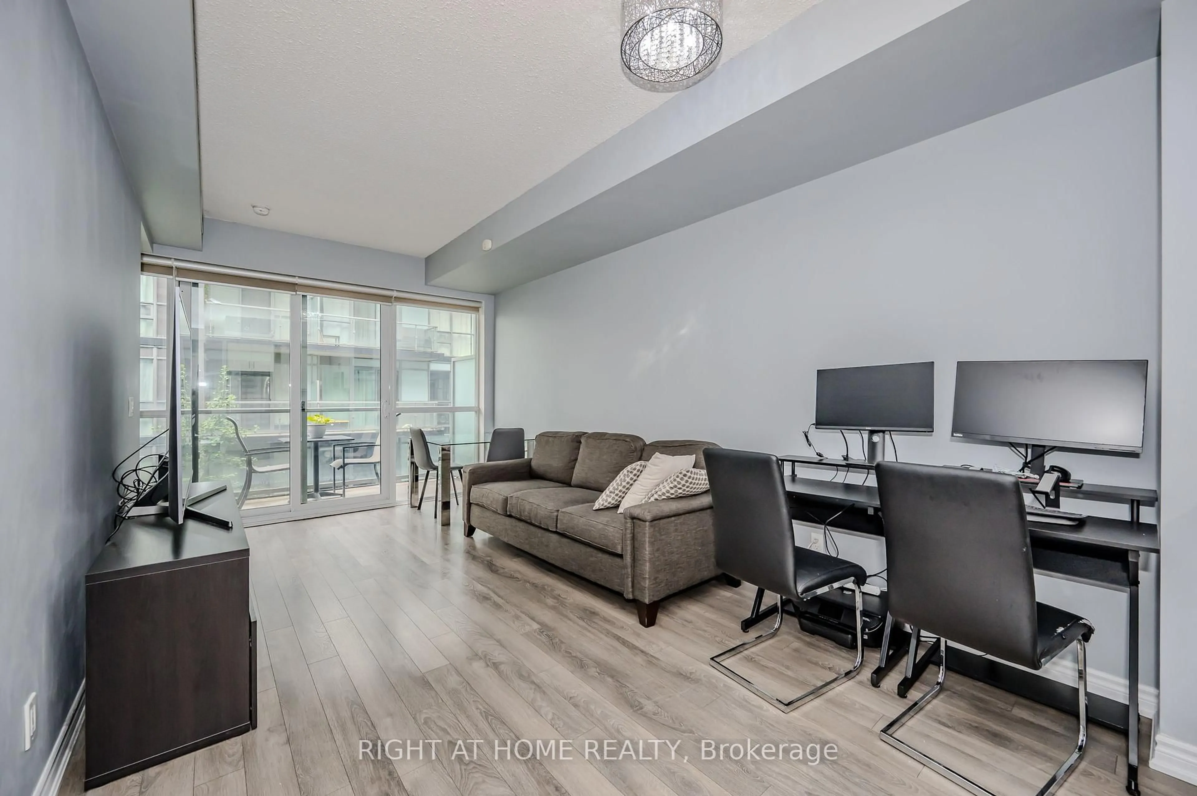 Living room with furniture, unknown for 15 James Finlay Way #917, Toronto Ontario M3M 0B3