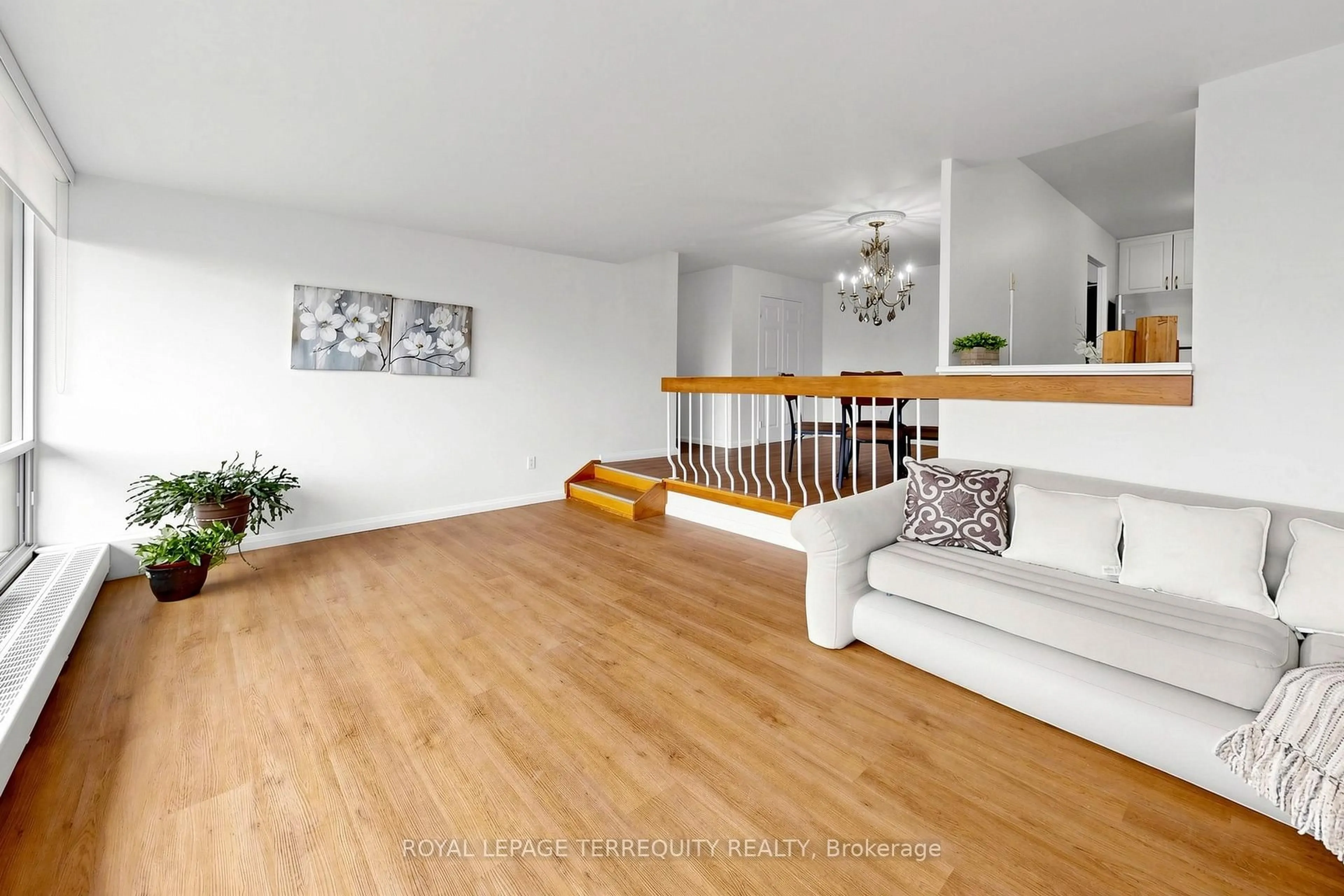 Living room with furniture, wood/laminate floor for 455 Sentinel Rd #1410, Toronto Ontario M3J 1V5