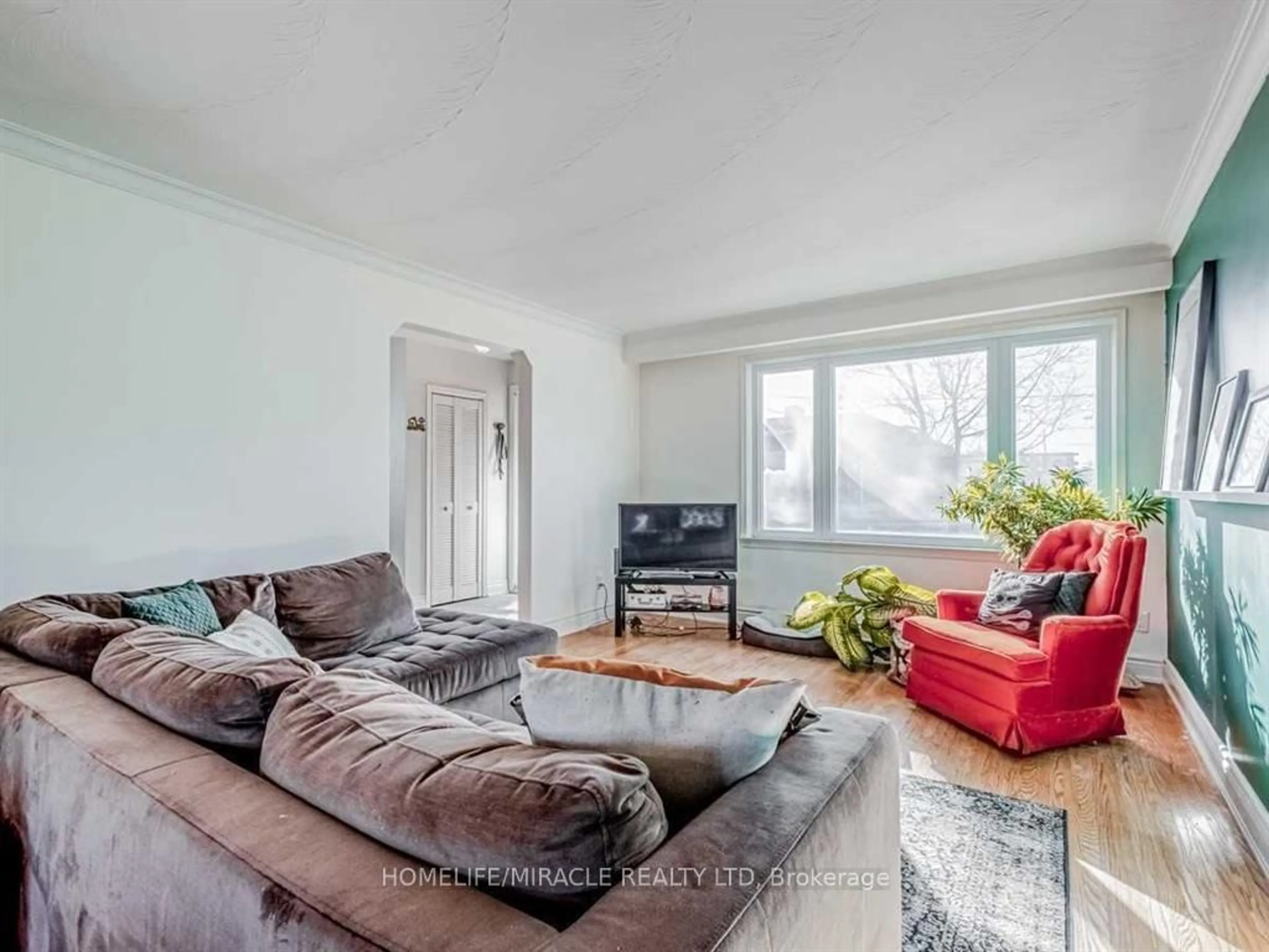 Living room with furniture, unknown for 276 Elmhurst Dr, Toronto Ontario M9W 2M2