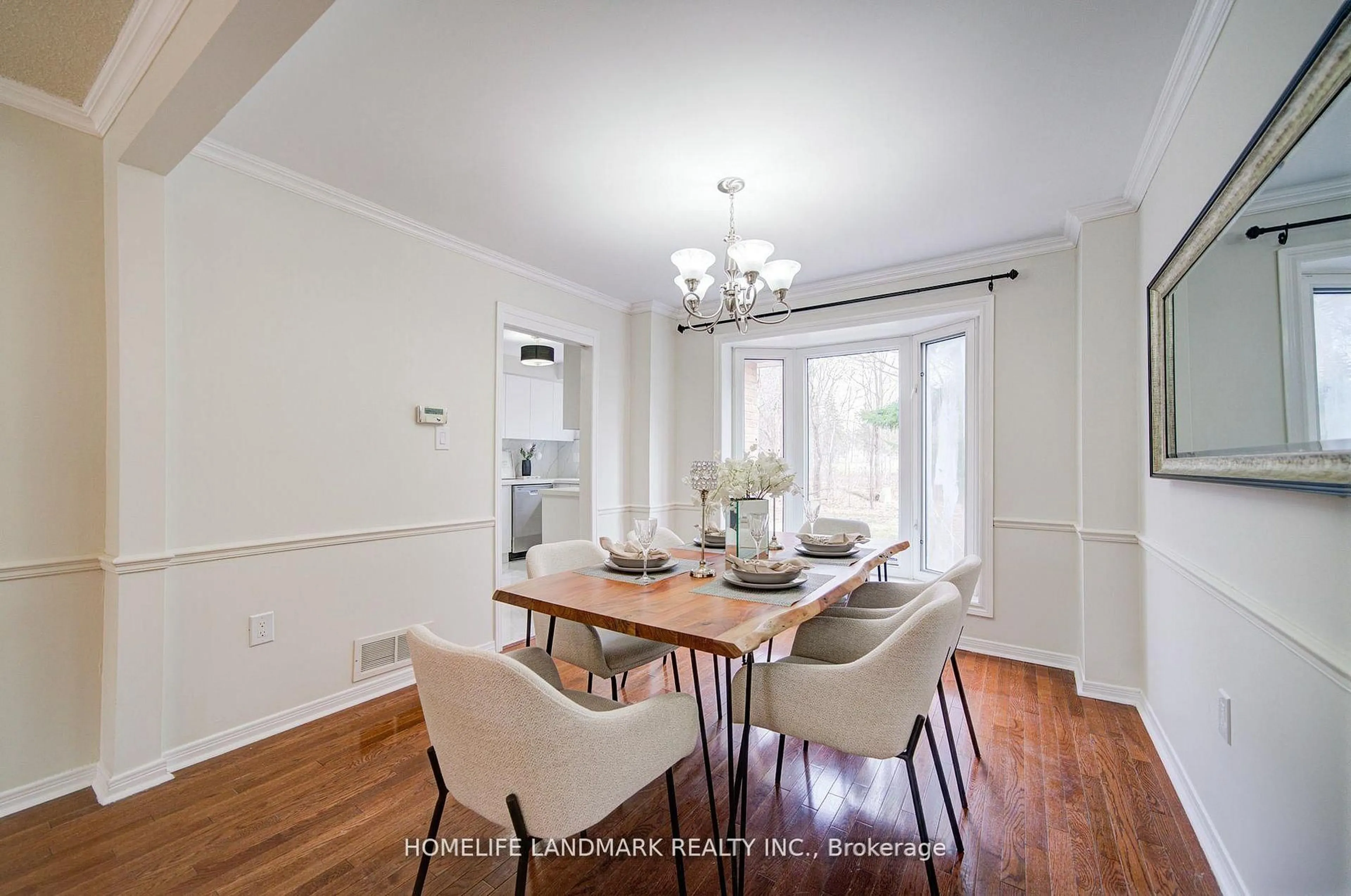 Dining room, wood/laminate floor for 1111 Deer Ru, Mississauga Ontario L5C 3P7