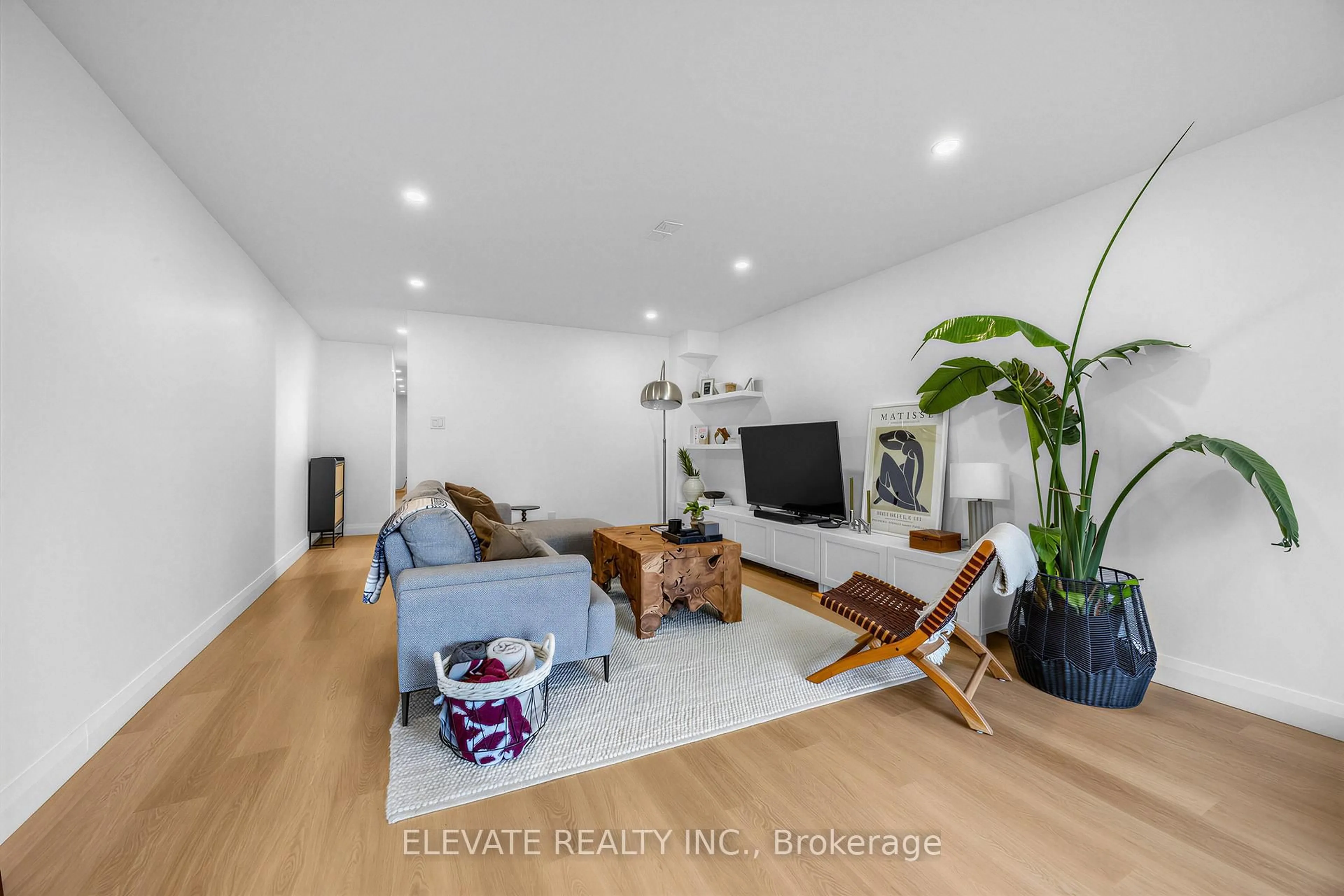 Living room with furniture, wood/laminate floor for 1 Mulock Ave, Toronto Ontario M6N 3C3