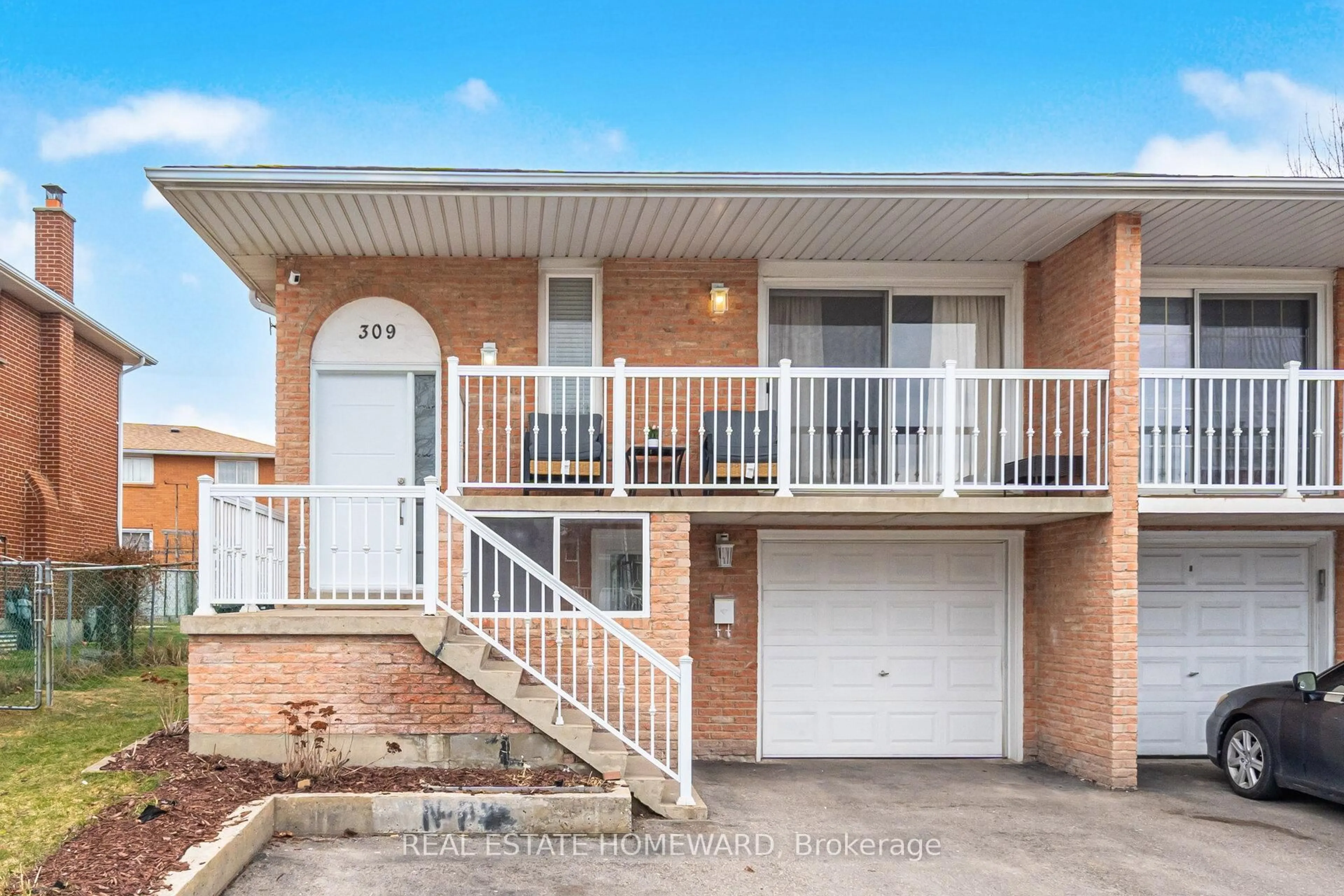 Home with brick exterior material, street for 309 Royal Salisbury Way, Brampton Ontario L6V 3G4