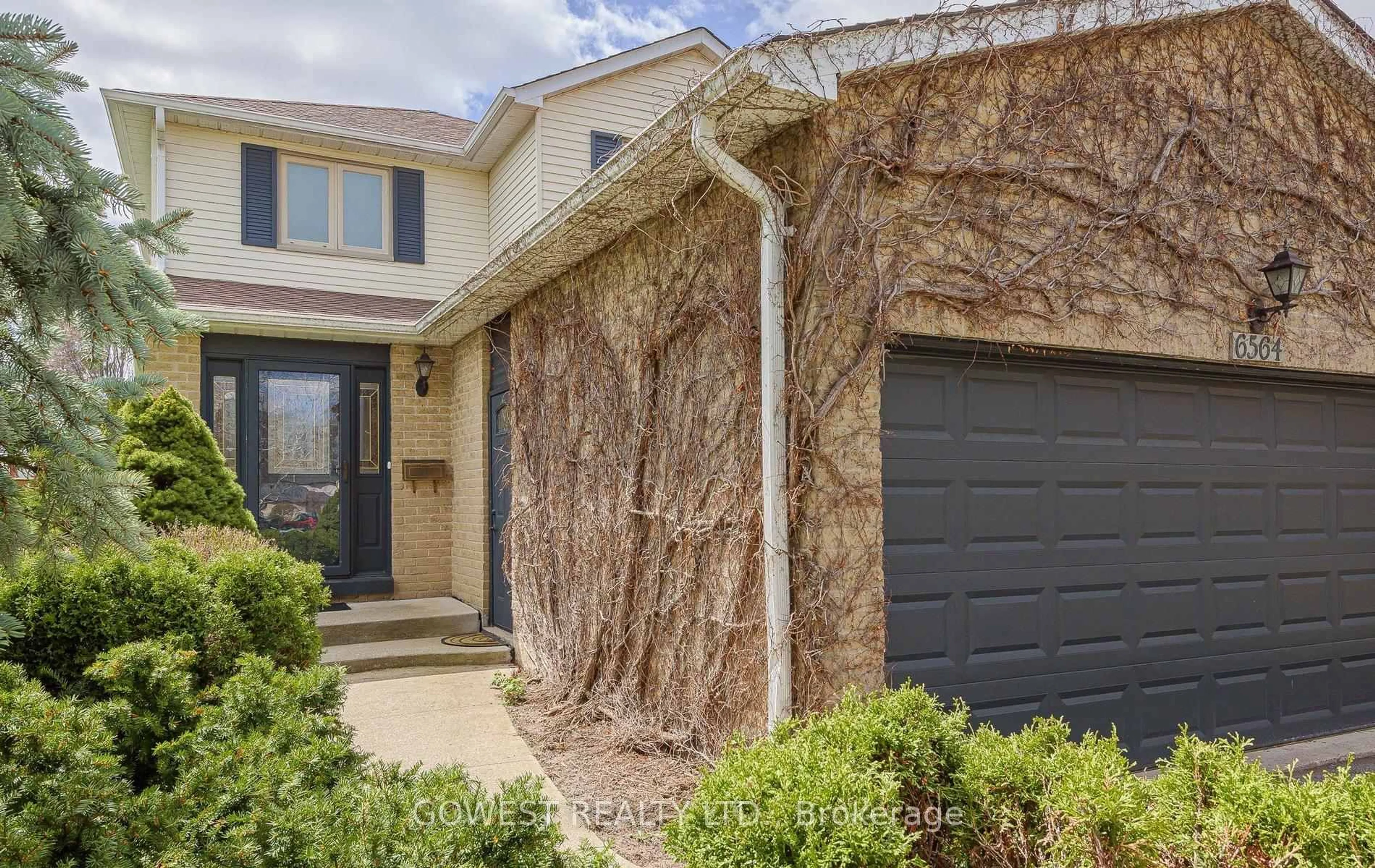 Home with brick exterior material, street for 6564 Edenwood Dr, Mississauga Ontario L5N 3L7