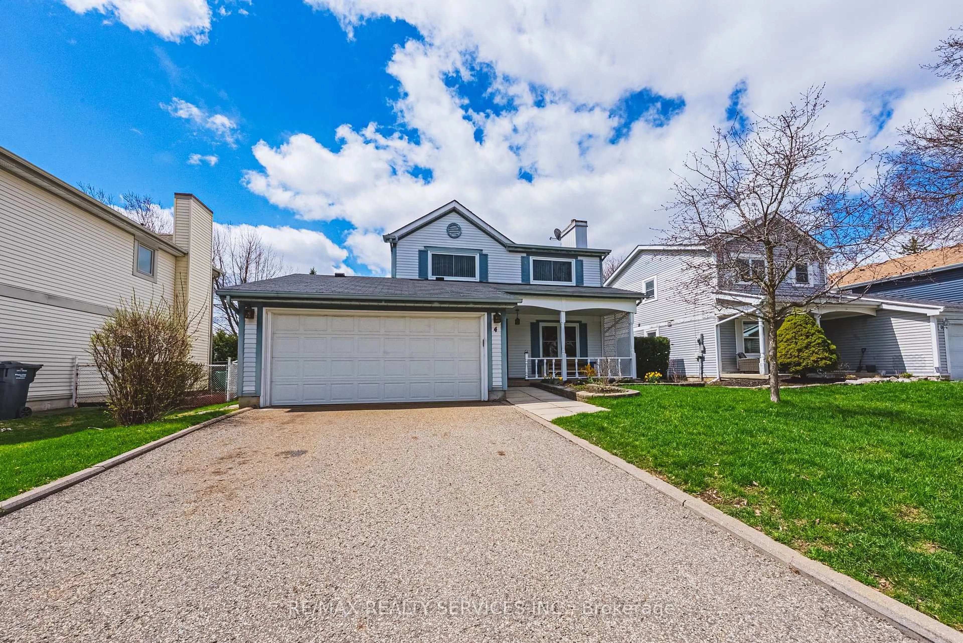 Home with vinyl exterior material, street for 4 Mount Forest Dr, Brampton Ontario L6Z 1B7