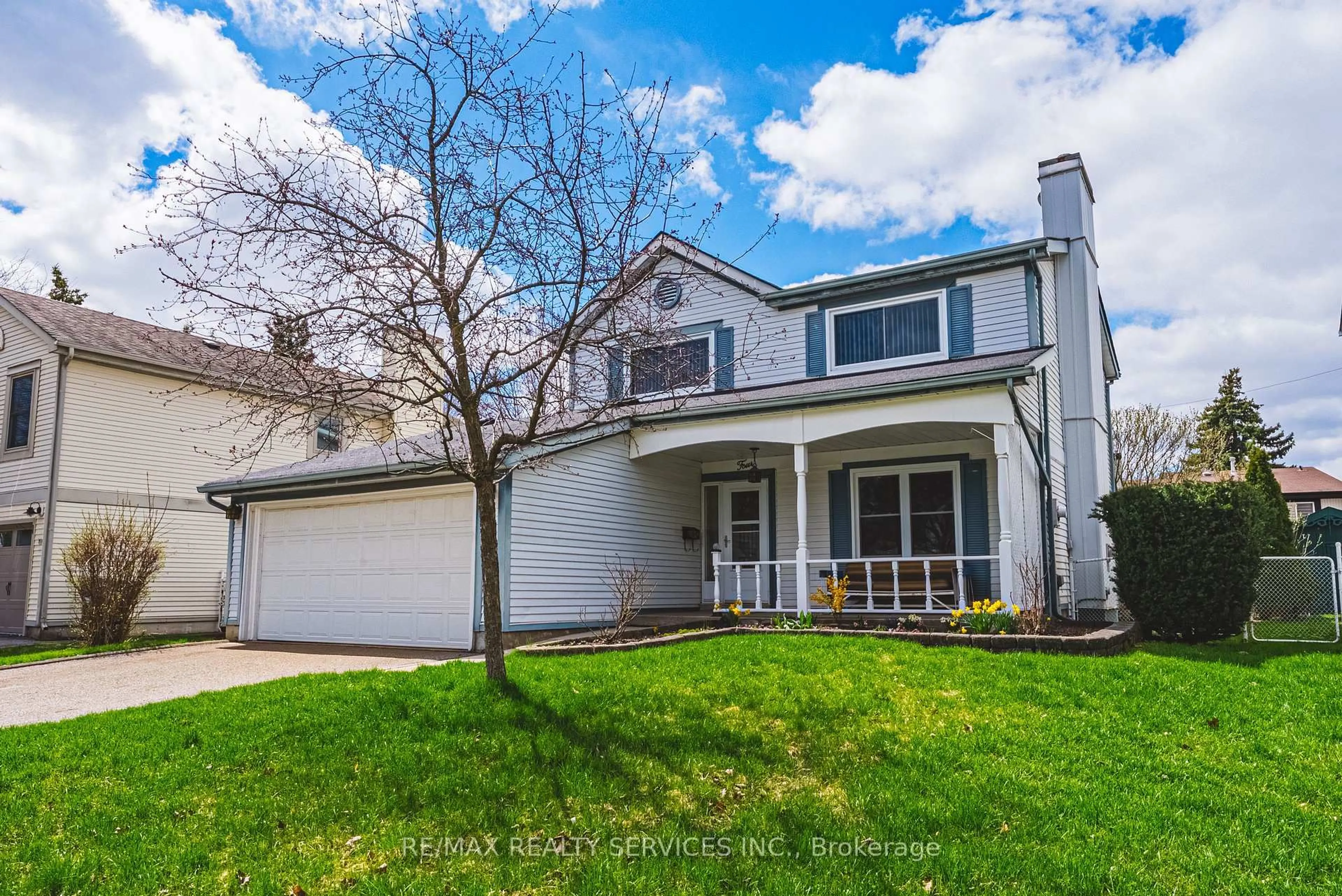 Home with vinyl exterior material, street for 4 Mount Forest Dr, Brampton Ontario L6Z 1B7