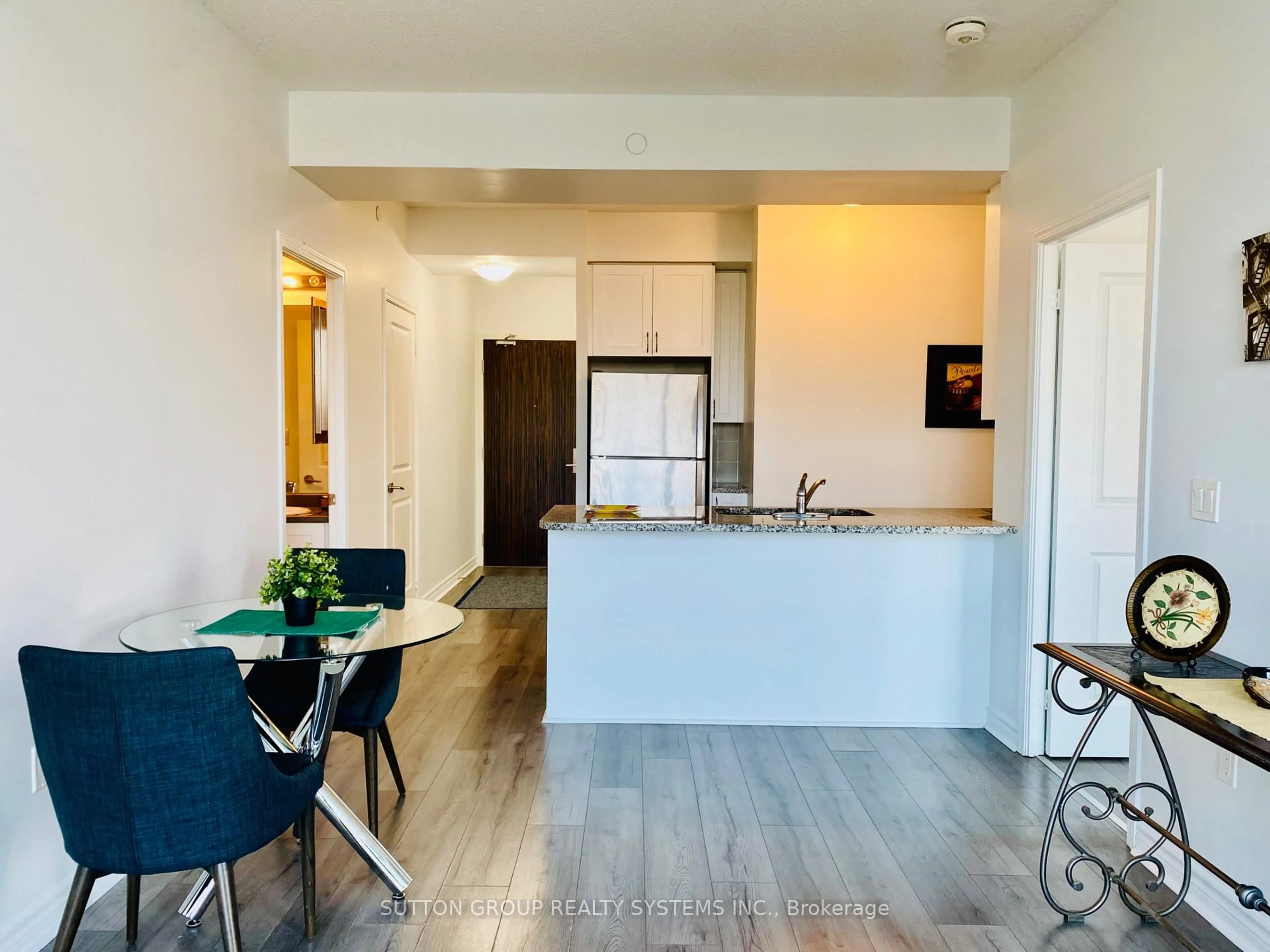 Open concept kitchen, wood/laminate floor for 349 Rathburn Rd #301, Mississauga Ontario L5B 0K6