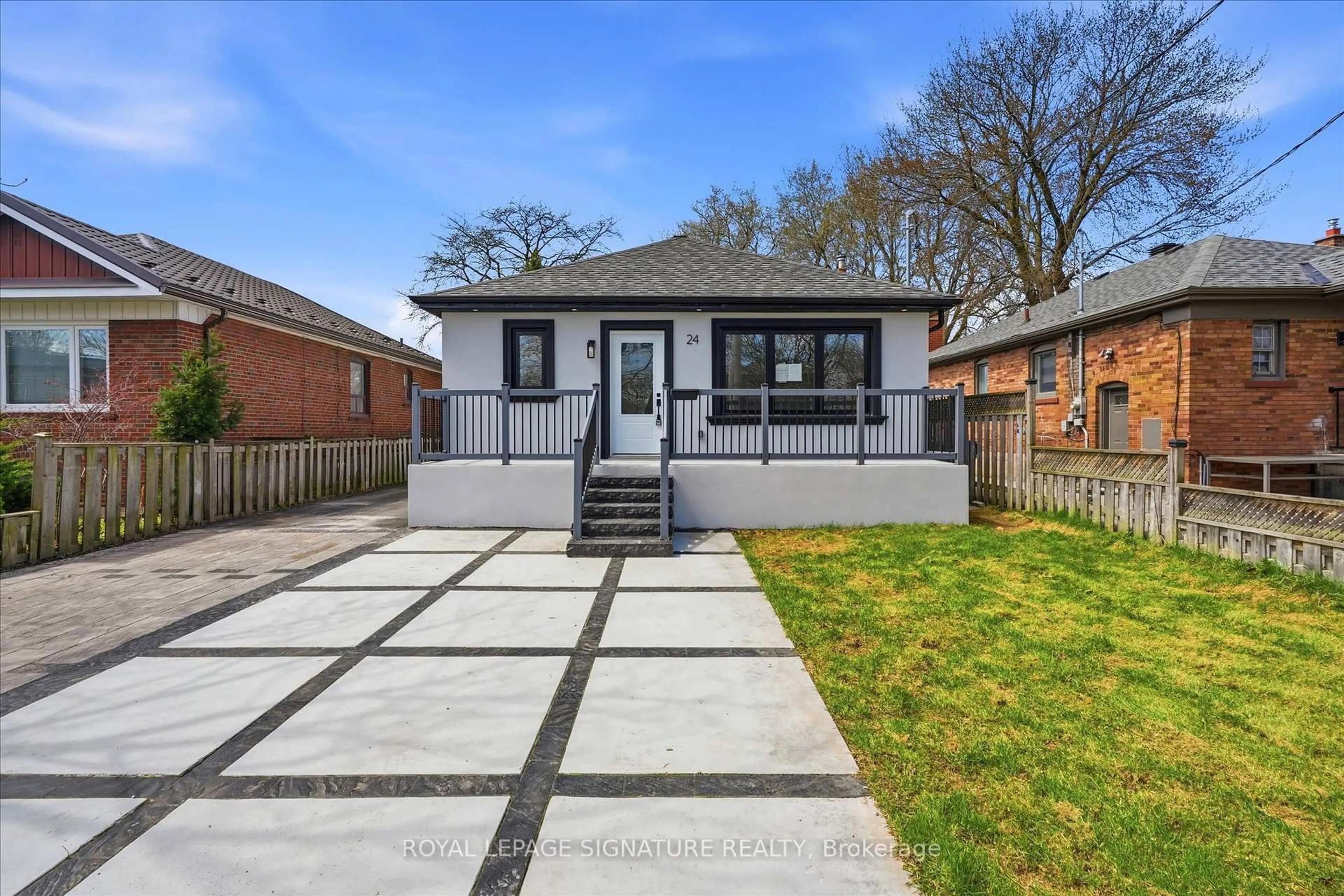 Home with brick exterior material, street for 24 Treeview Dr, Toronto Ontario M8W 4B9