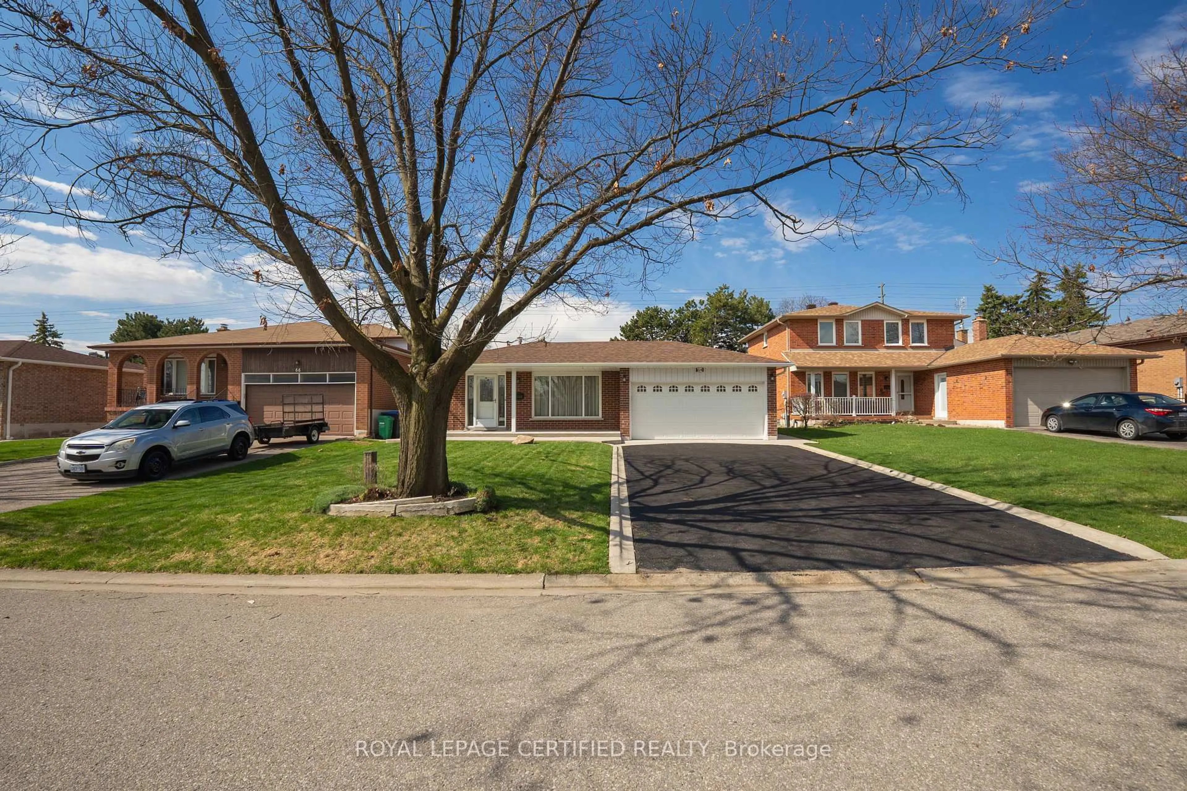 Home with brick exterior material, street for 64 Malcolm Cres, Brampton Ontario L6S 3C8