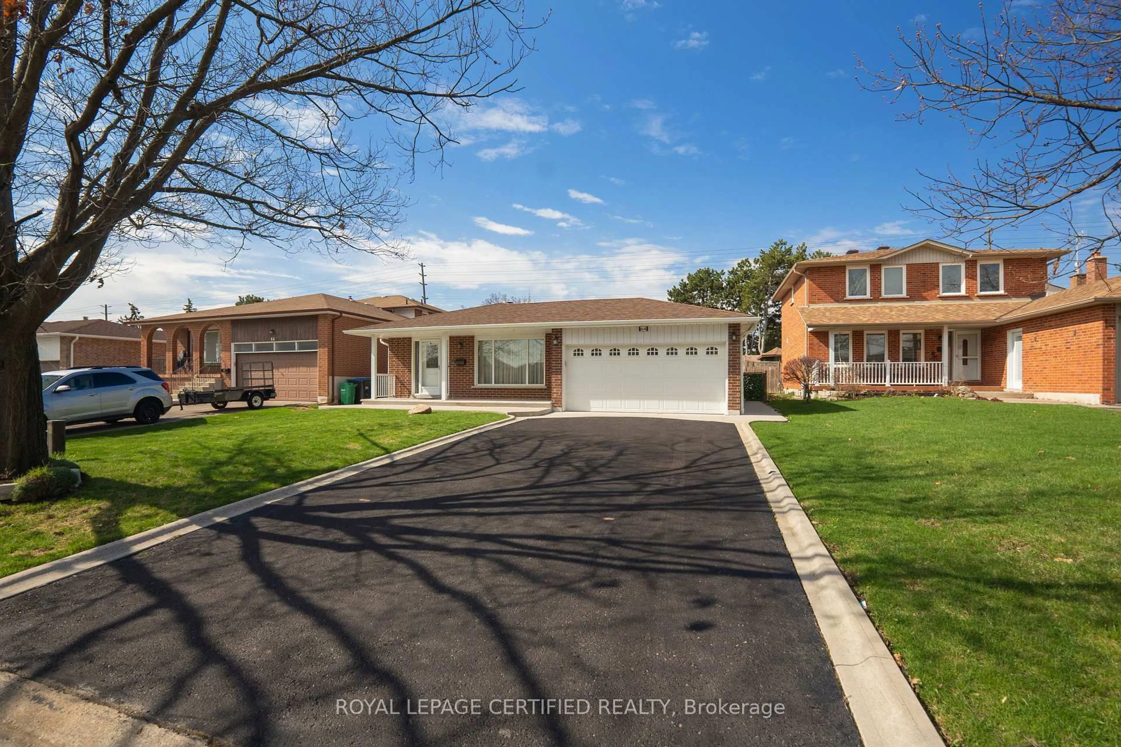 Home with brick exterior material, street for 64 Malcolm Cres, Brampton Ontario L6S 3C8