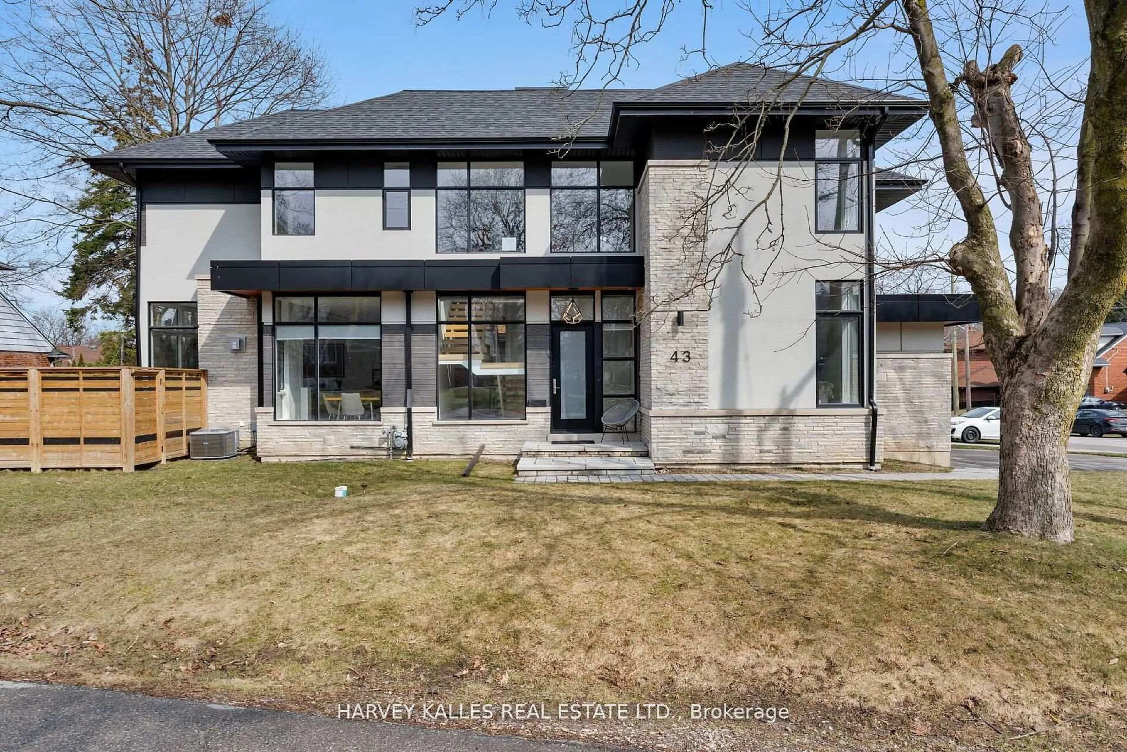 Home with brick exterior material, street for 43 Ballacaine Dr, Toronto Ontario M8Y 4B1