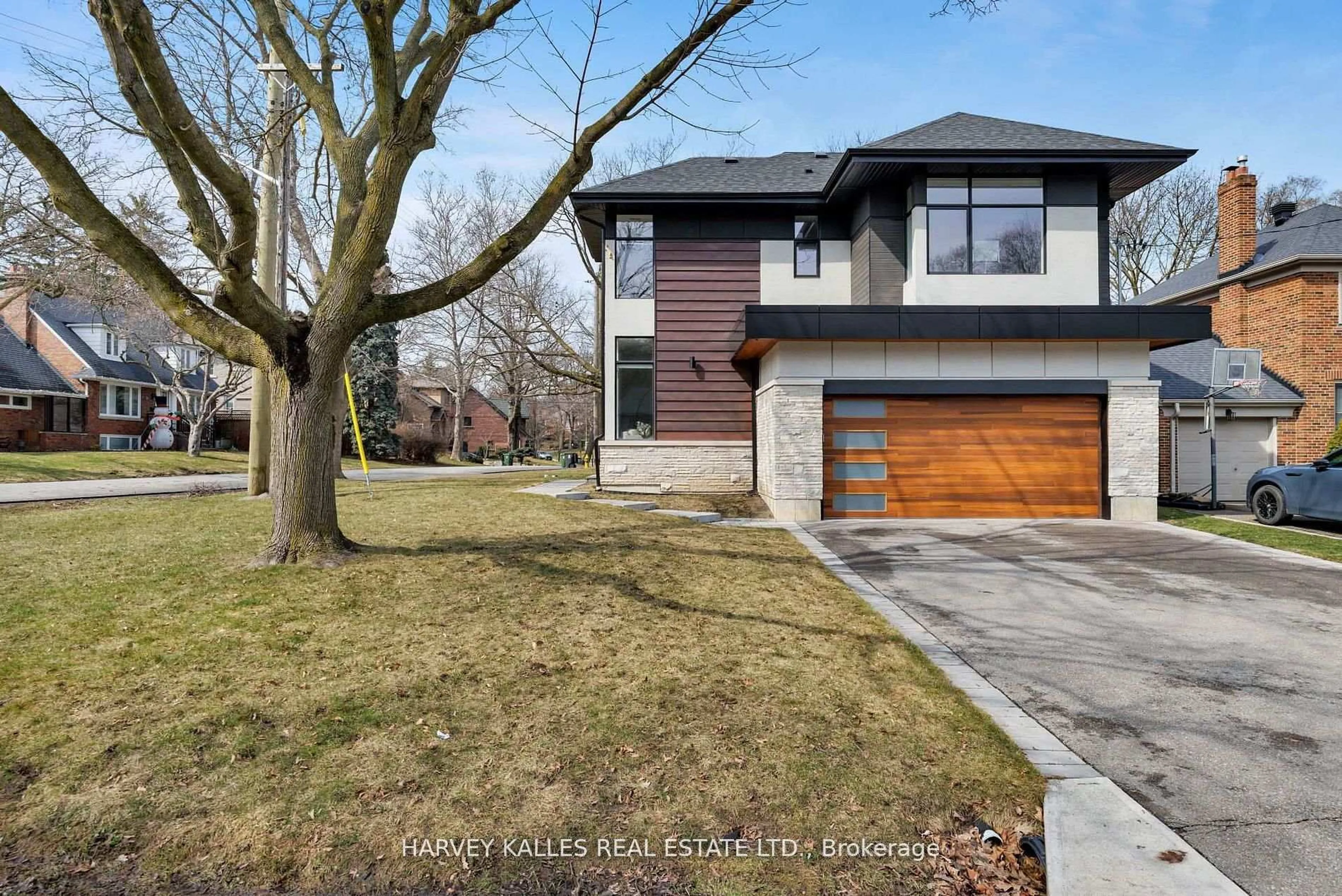 Home with brick exterior material, street for 43 Ballacaine Dr, Toronto Ontario M8Y 4B1