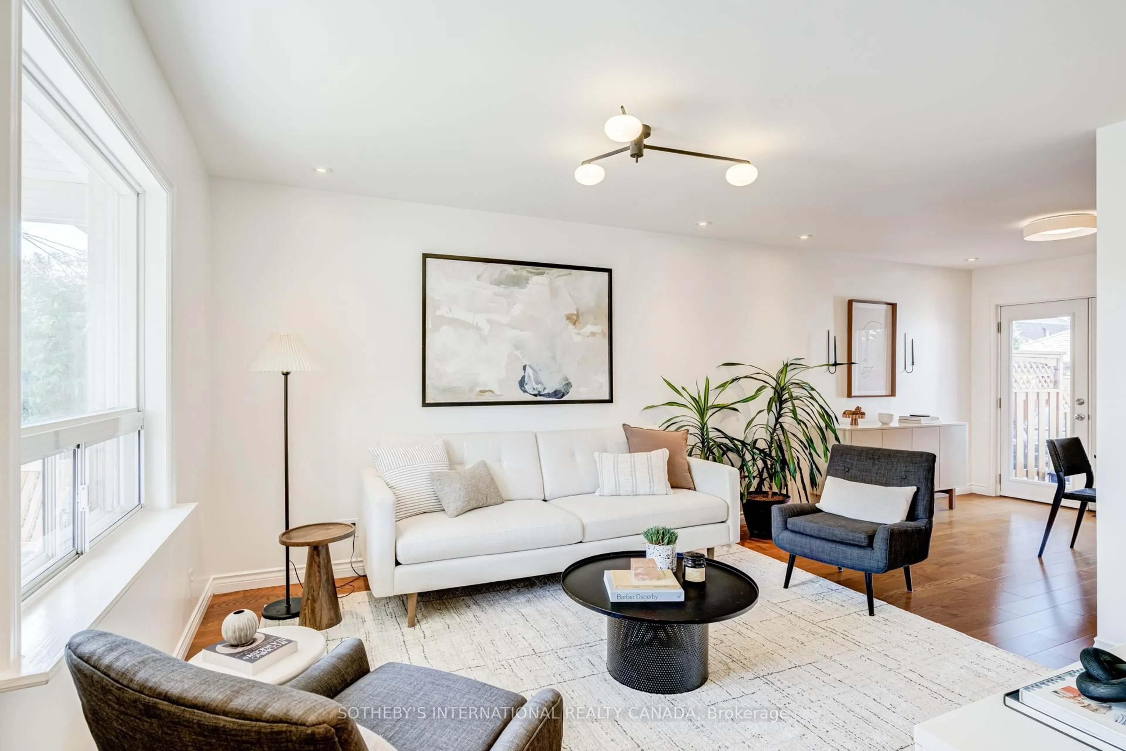 Living room with furniture, unknown for 712 Willard Ave, Toronto Ontario M6S 3S5