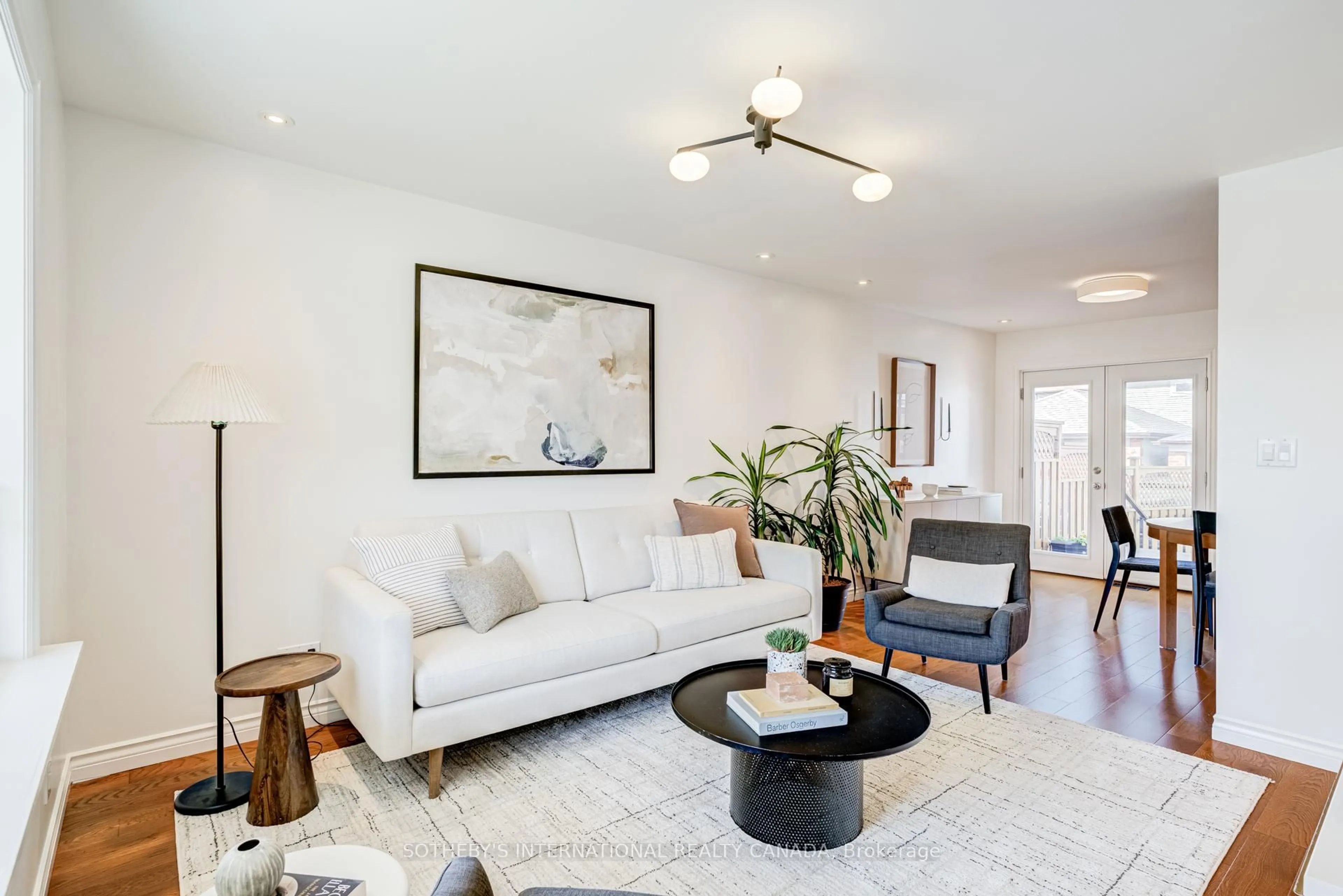 Living room with furniture, unknown for 712 Willard Ave, Toronto Ontario M6S 3S5