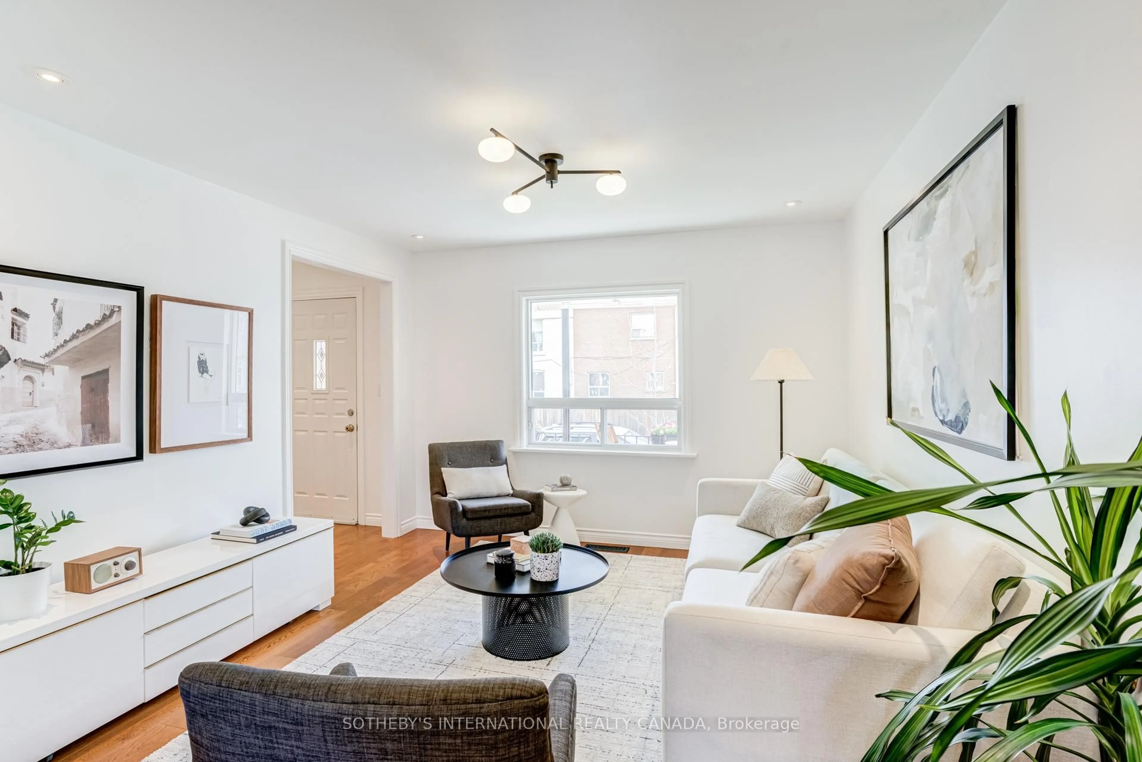 Living room with furniture, unknown for 712 Willard Ave, Toronto Ontario M6S 3S5