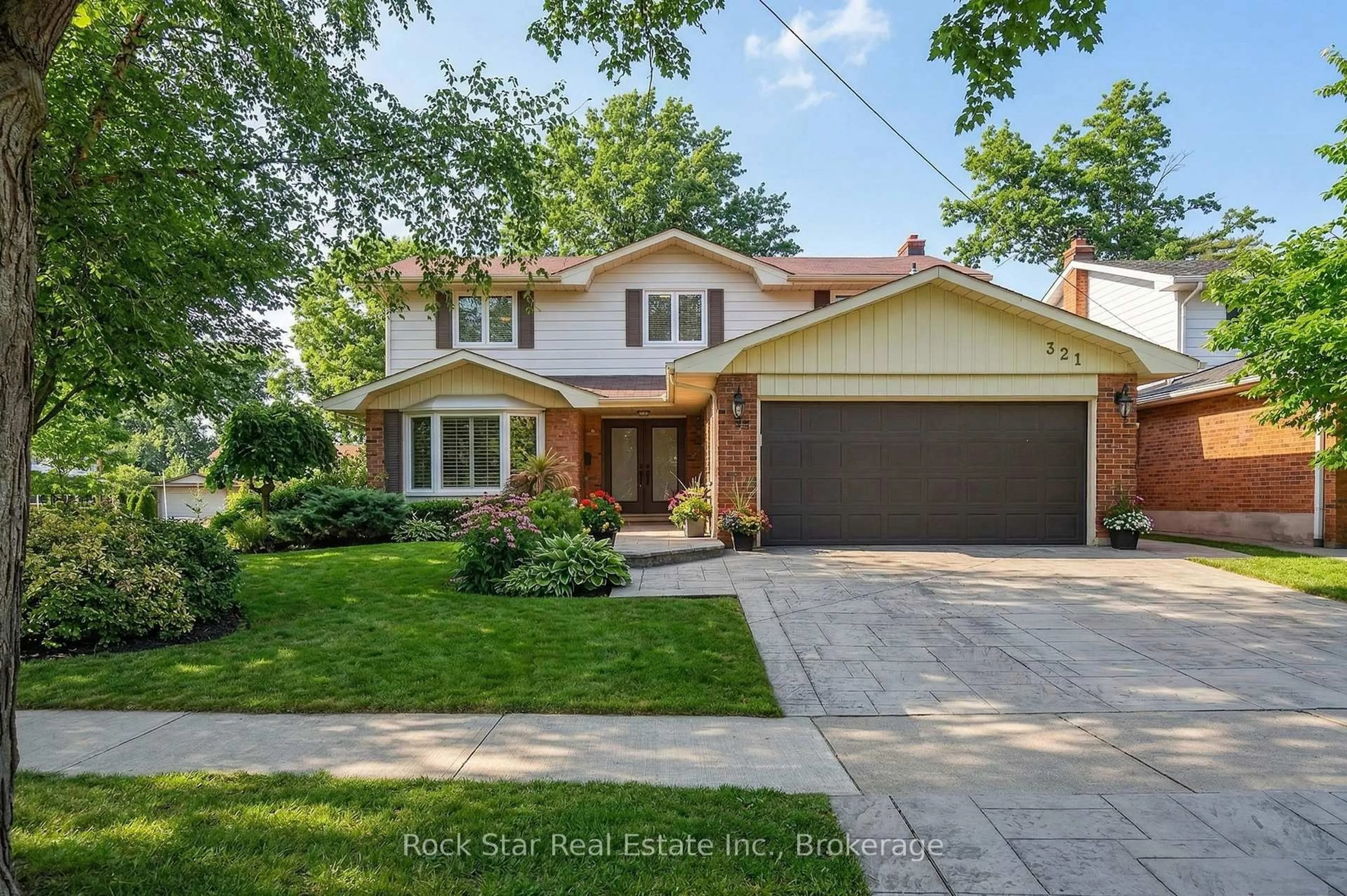 Home with brick exterior material, street for 321 Bryant Cres, Burlington Ontario L7L 4Z1