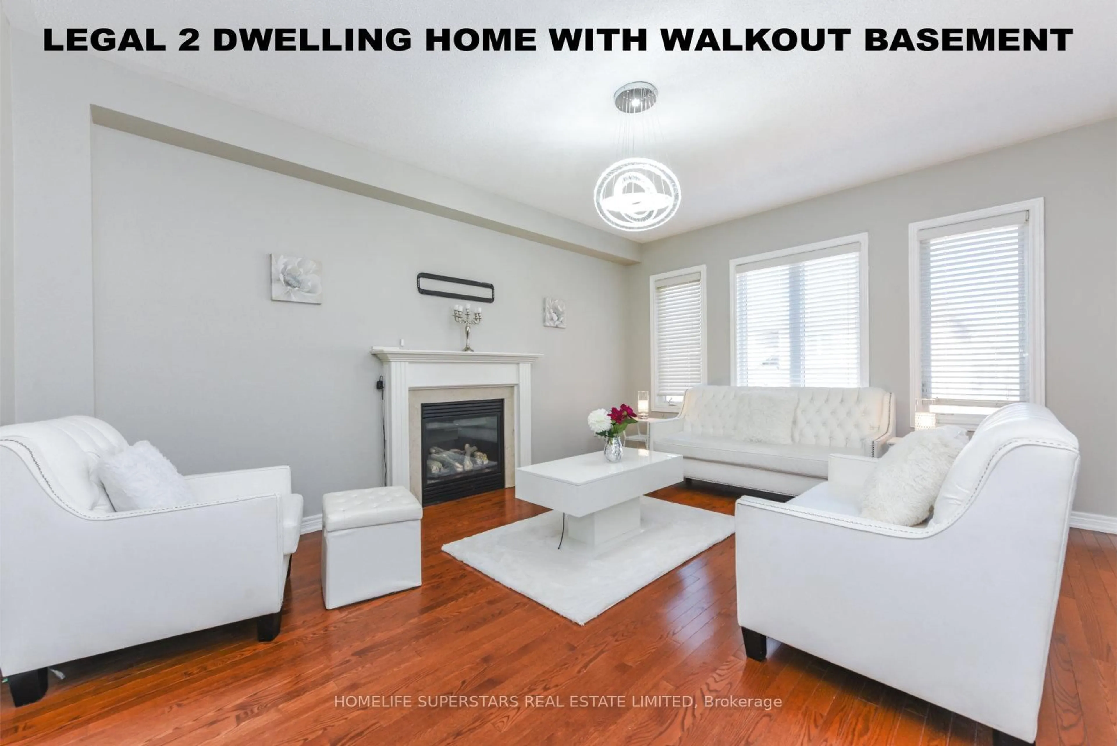 Living room with furniture, wood/laminate floor for 5 Amy Ave, Brampton Ontario L6P 3L7