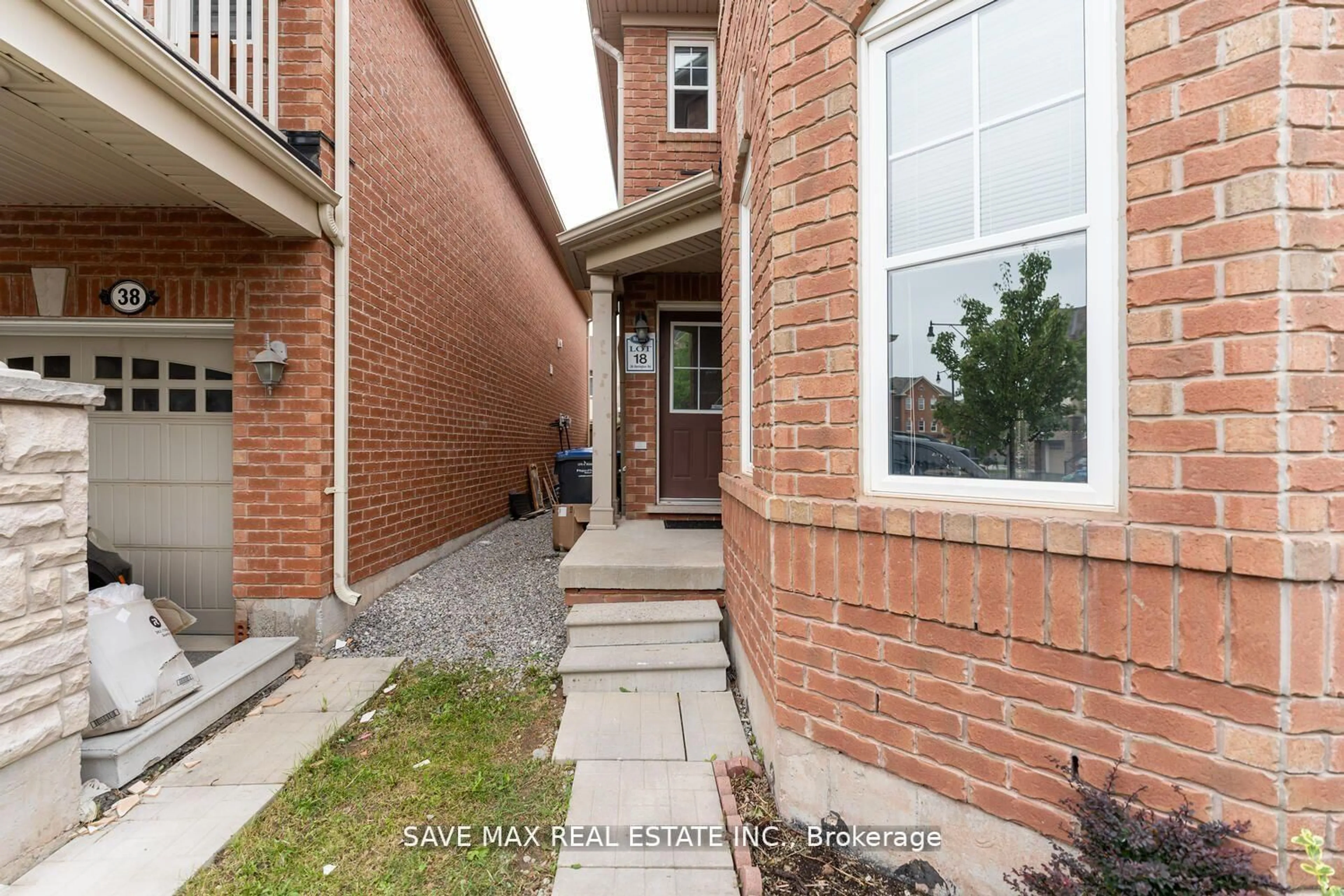Home with brick exterior material, street for 36 Bevington Rd, Brampton Ontario L7A 0R9