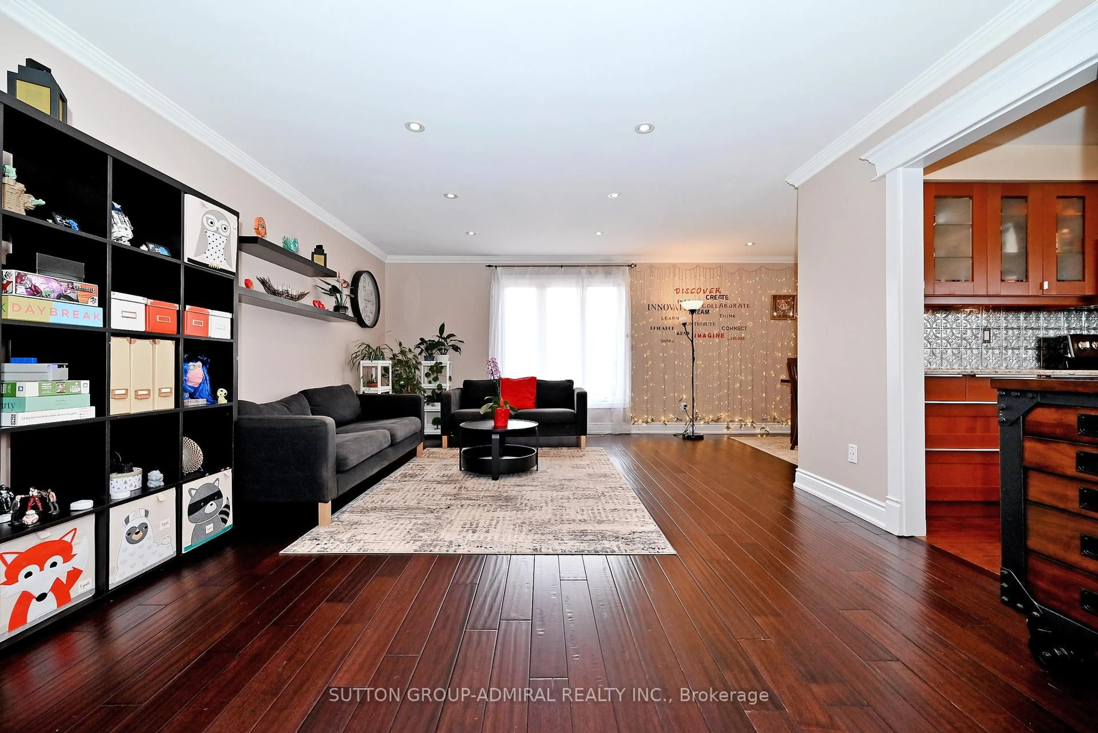 Living room with furniture, wood/laminate floor for 21 Bigham Cres, Toronto Ontario M9C 5C5