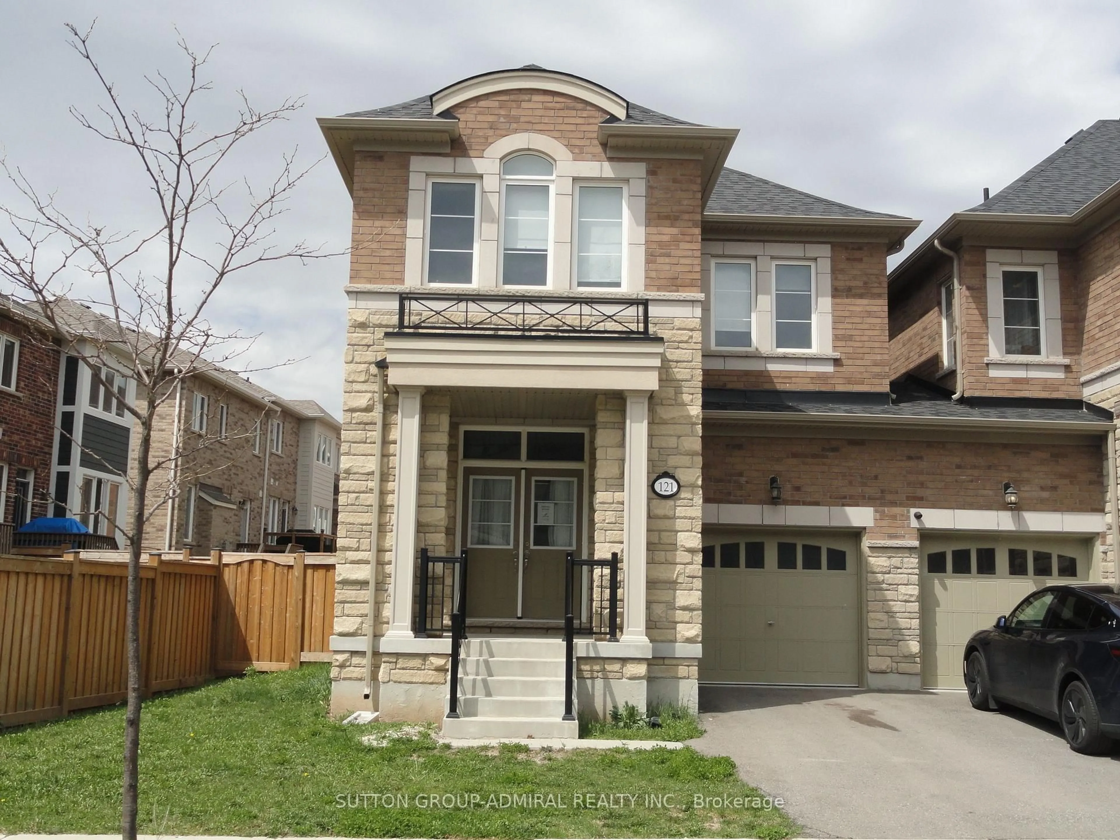 Home with brick exterior material, street for 121 Marigold Gardens, Oakville Ontario L6H 0X1