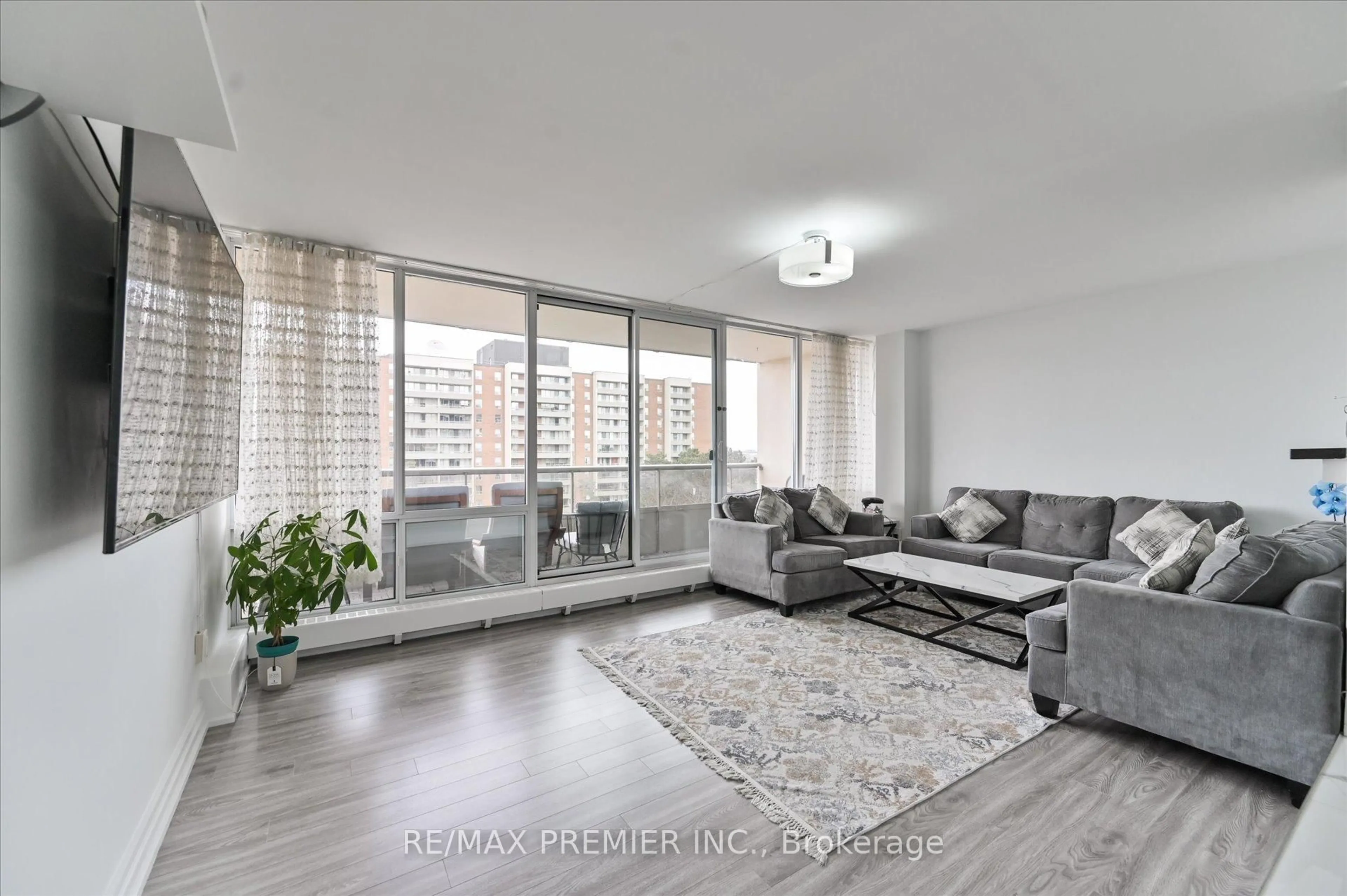 Living room with furniture, unknown for 25 Four Winds Dr #604, Toronto Ontario M3J 1K8