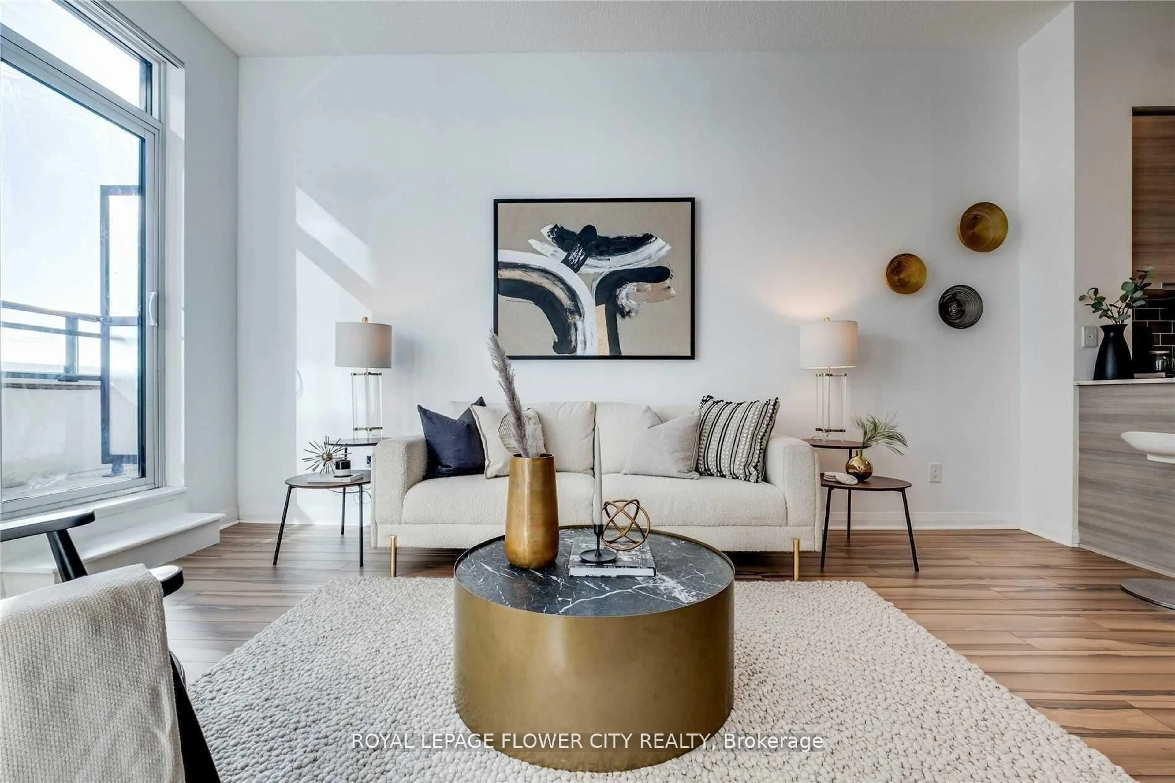 Living room with furniture, unknown for 55 Eglinton Ave #310, Mississauga Ontario L5R 0E4