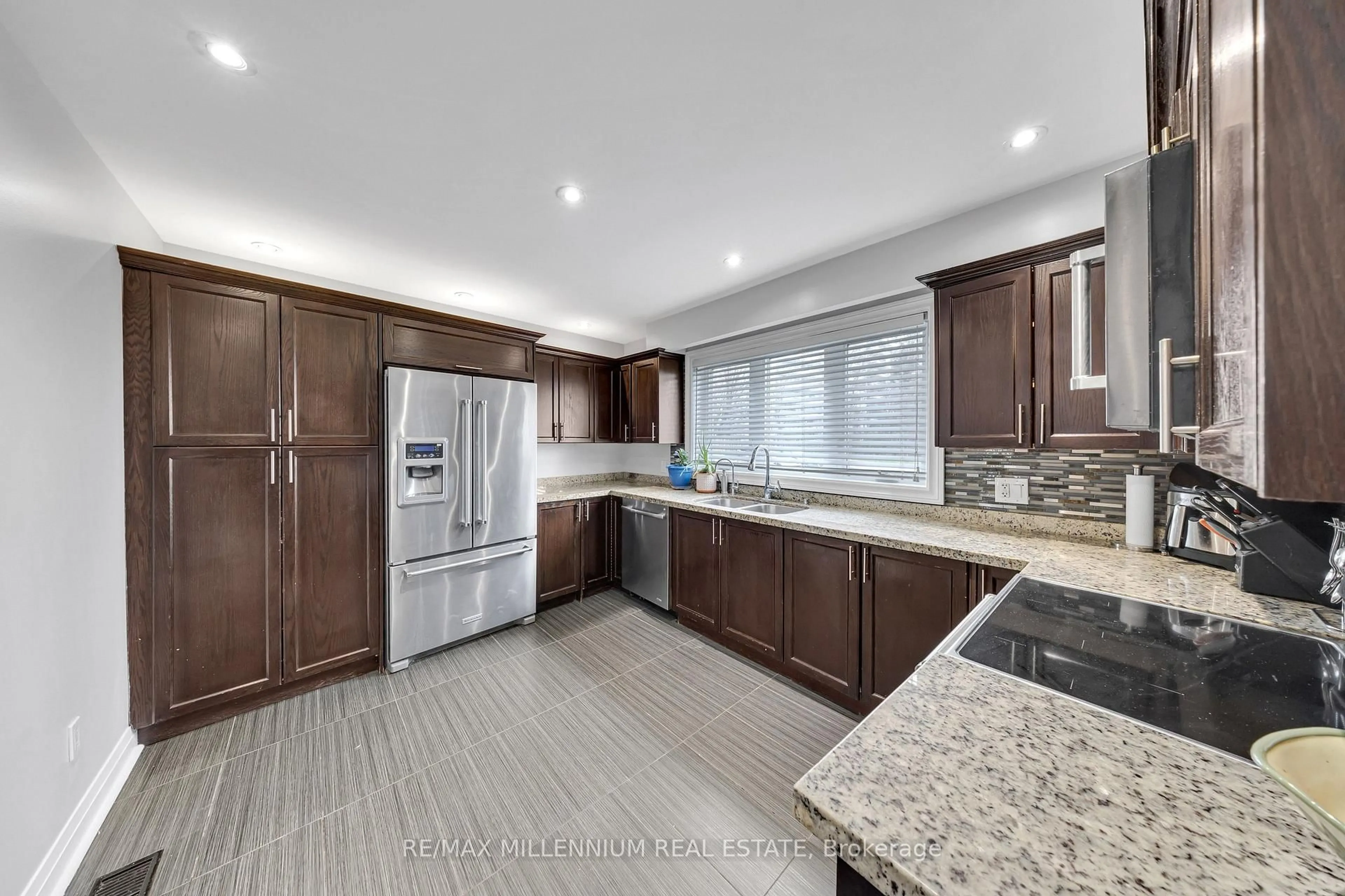 Open concept kitchen, ceramic/tile floor for 10 Grandravine Dr #5, Toronto Ontario M3J 1B1