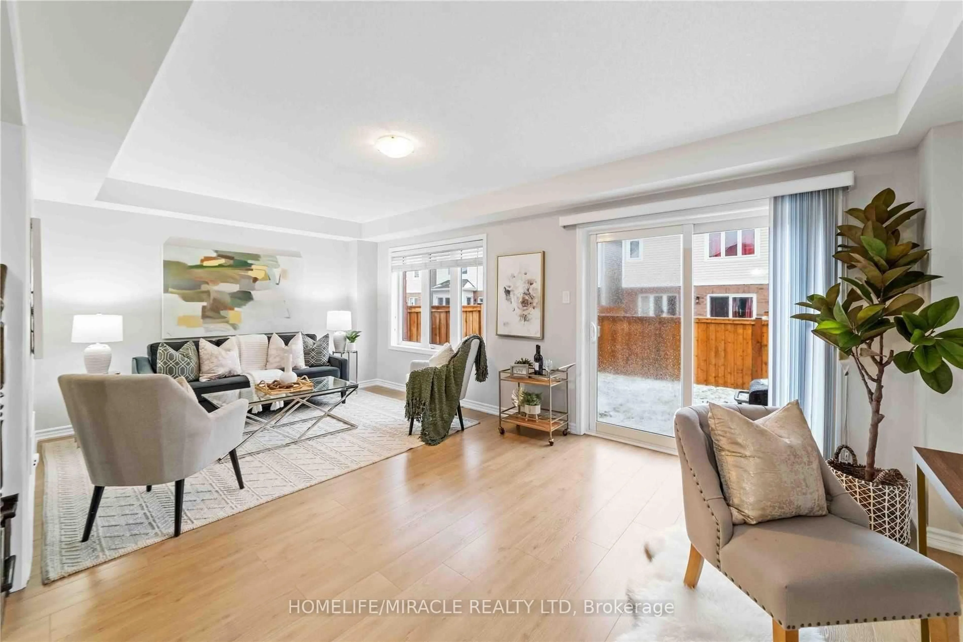 Living room with furniture, unknown for 21 Donlamont Circ, Brampton Ontario L7A 4T5