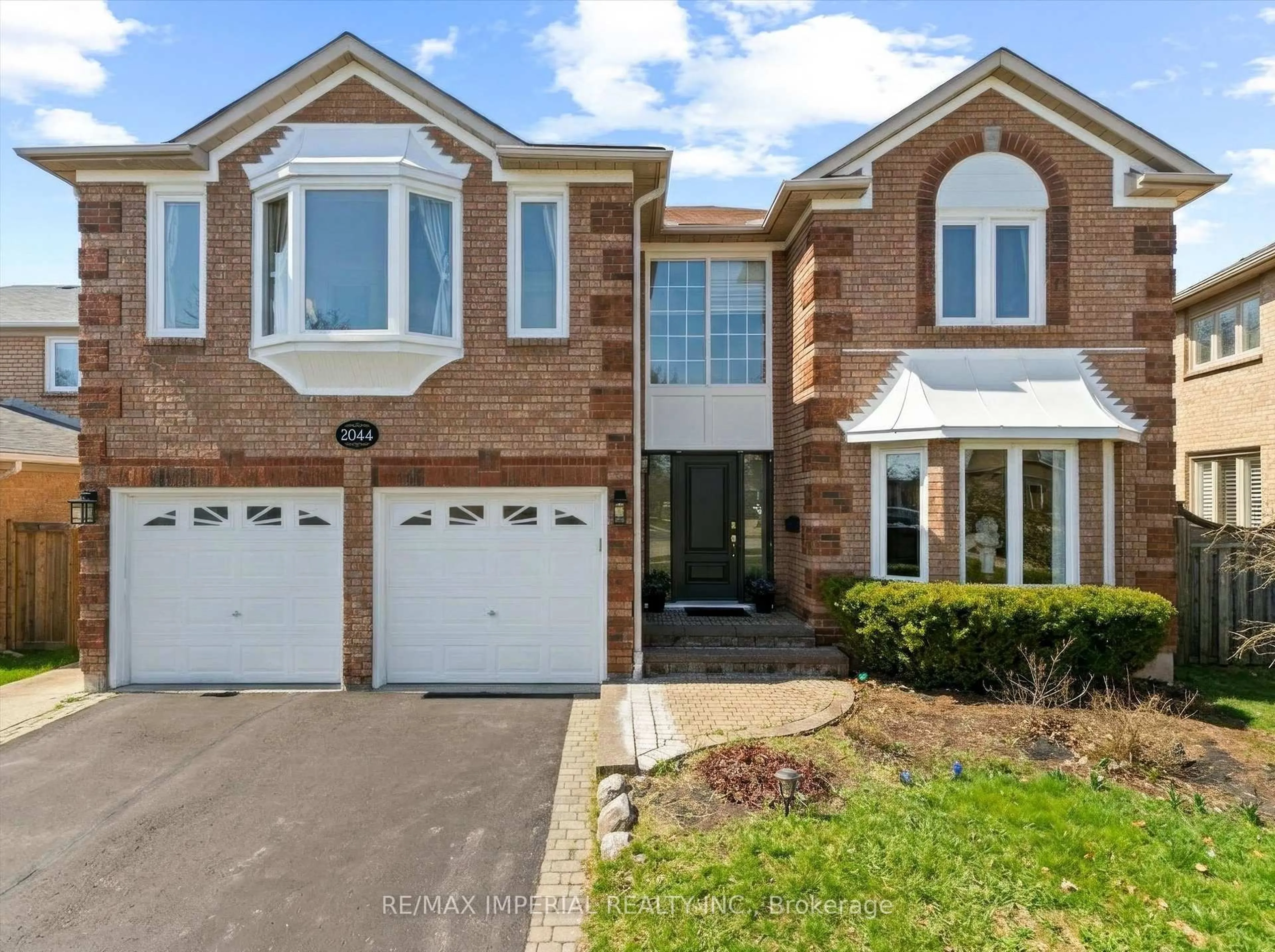 Home with brick exterior material, street for 2044 Schoolmaster Circ, Oakville Ontario L6M 3A1
