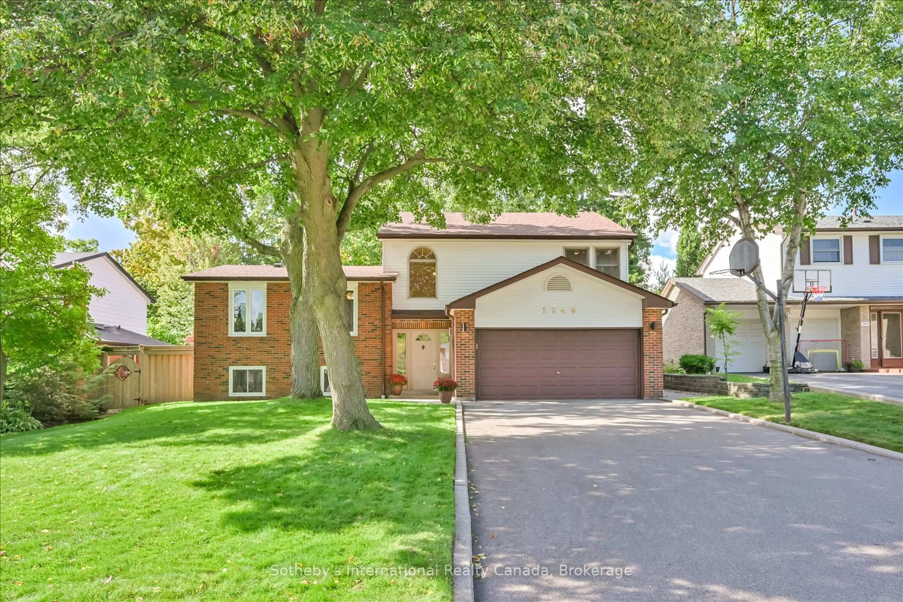 Home with brick exterior material, street for 1248 Landfair Cres, Oakville Ontario L6H 2N3
