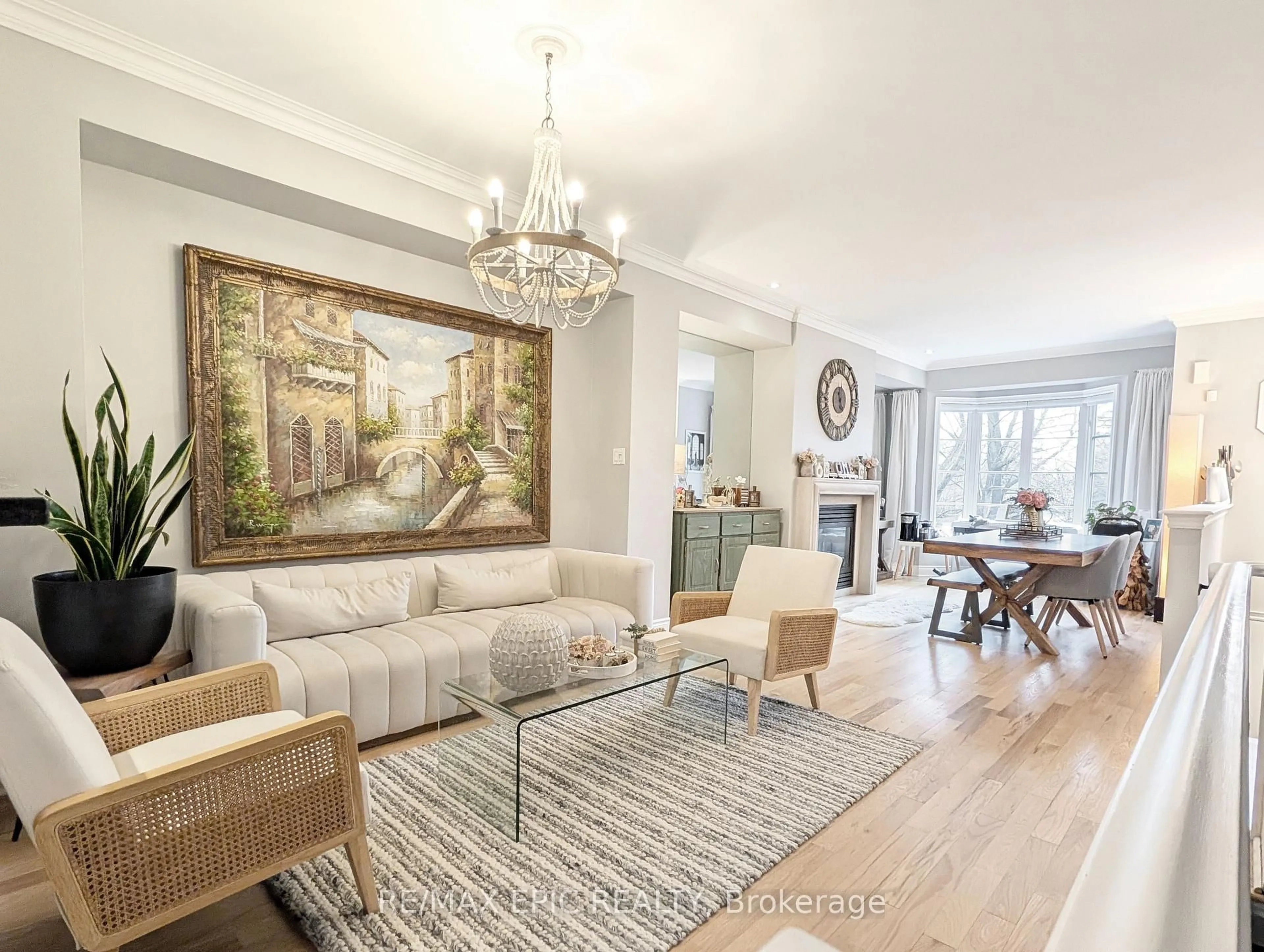 Living room with furniture, wood/laminate floor for 235 VAN DUSEN Blvd #3, Toronto Ontario M8Z 3J2