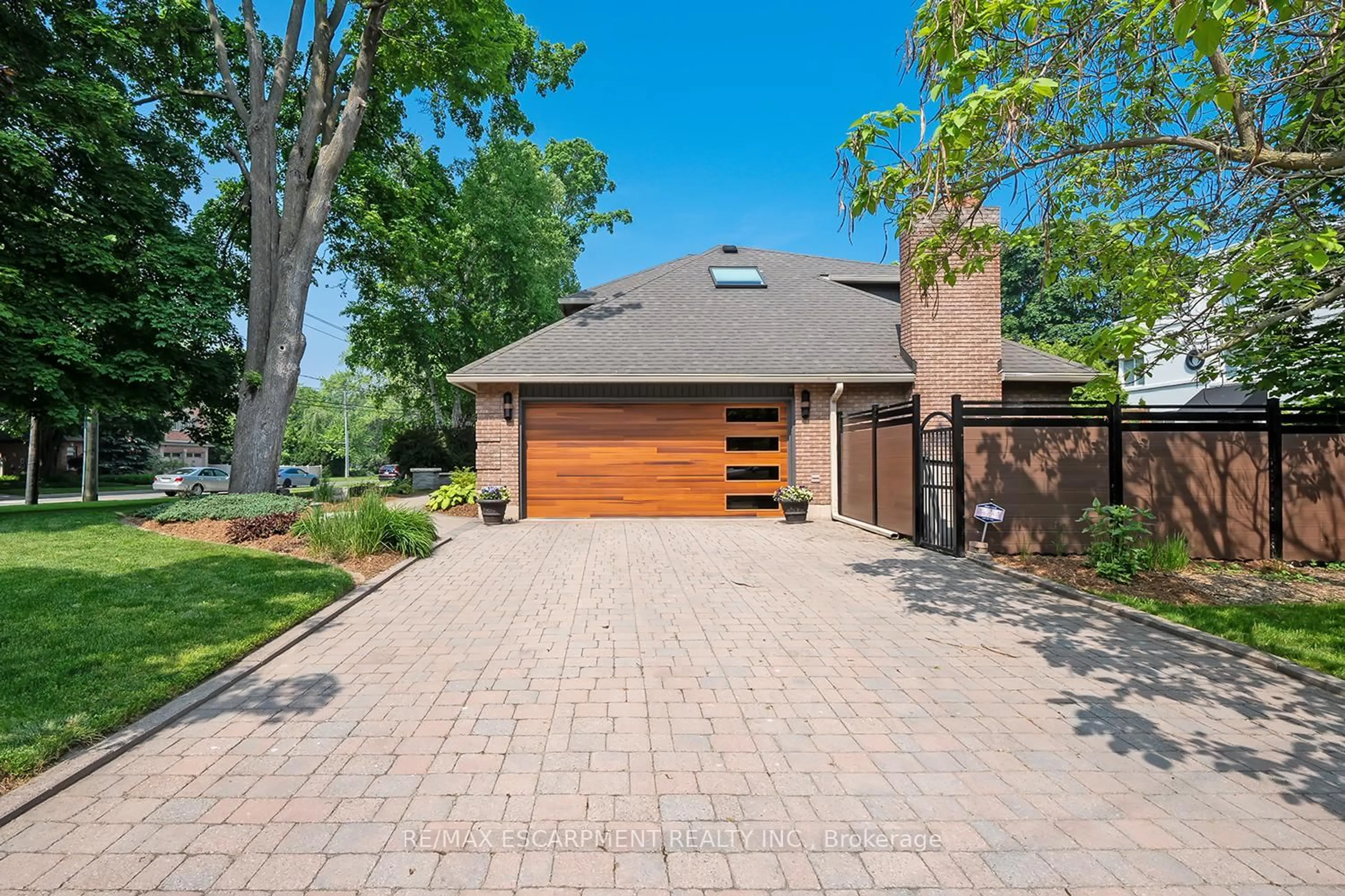 Home with brick exterior material, street for 2428 Lakeshore Rd, Burlington Ontario L7R 1C1