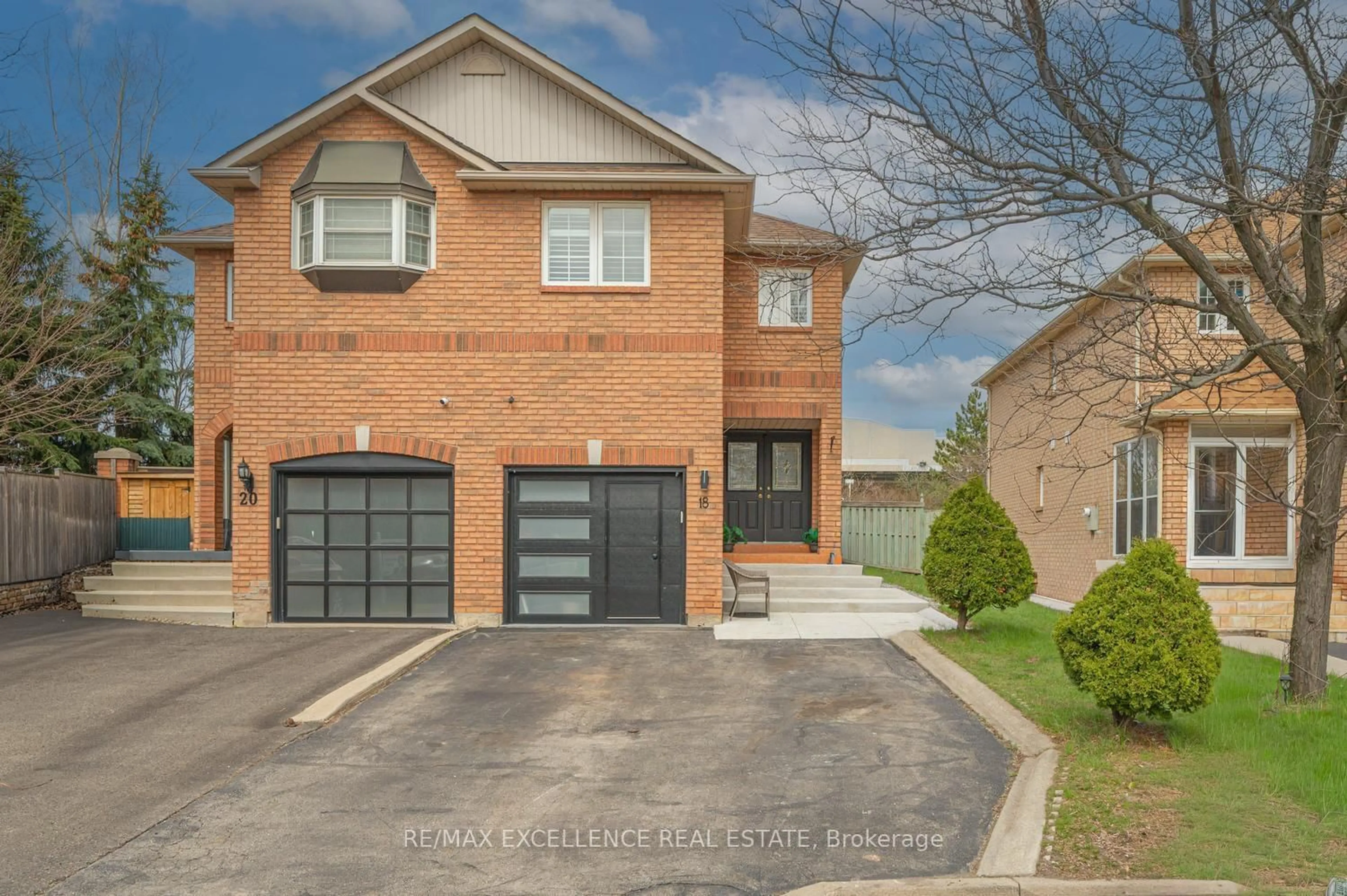 Home with brick exterior material, street for 18 Manett Cres, Brampton Ontario L6X 4X4
