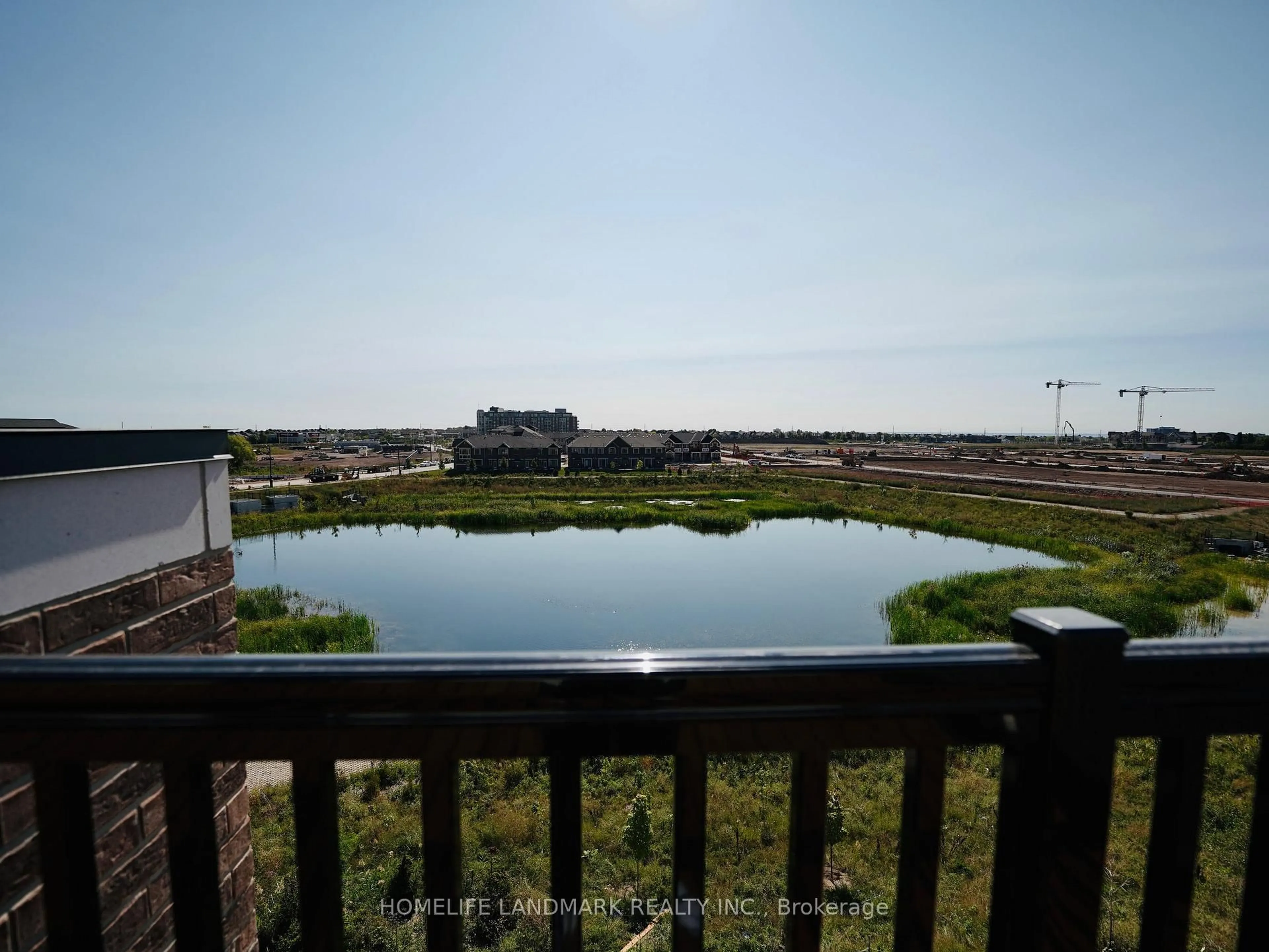 A pic from outside/outdoor area/front of a property/back of a property/a pic from drone, water/lake/river/ocean view for 3070 John Mckay Blvd #17, Oakville Ontario L6H 4K5