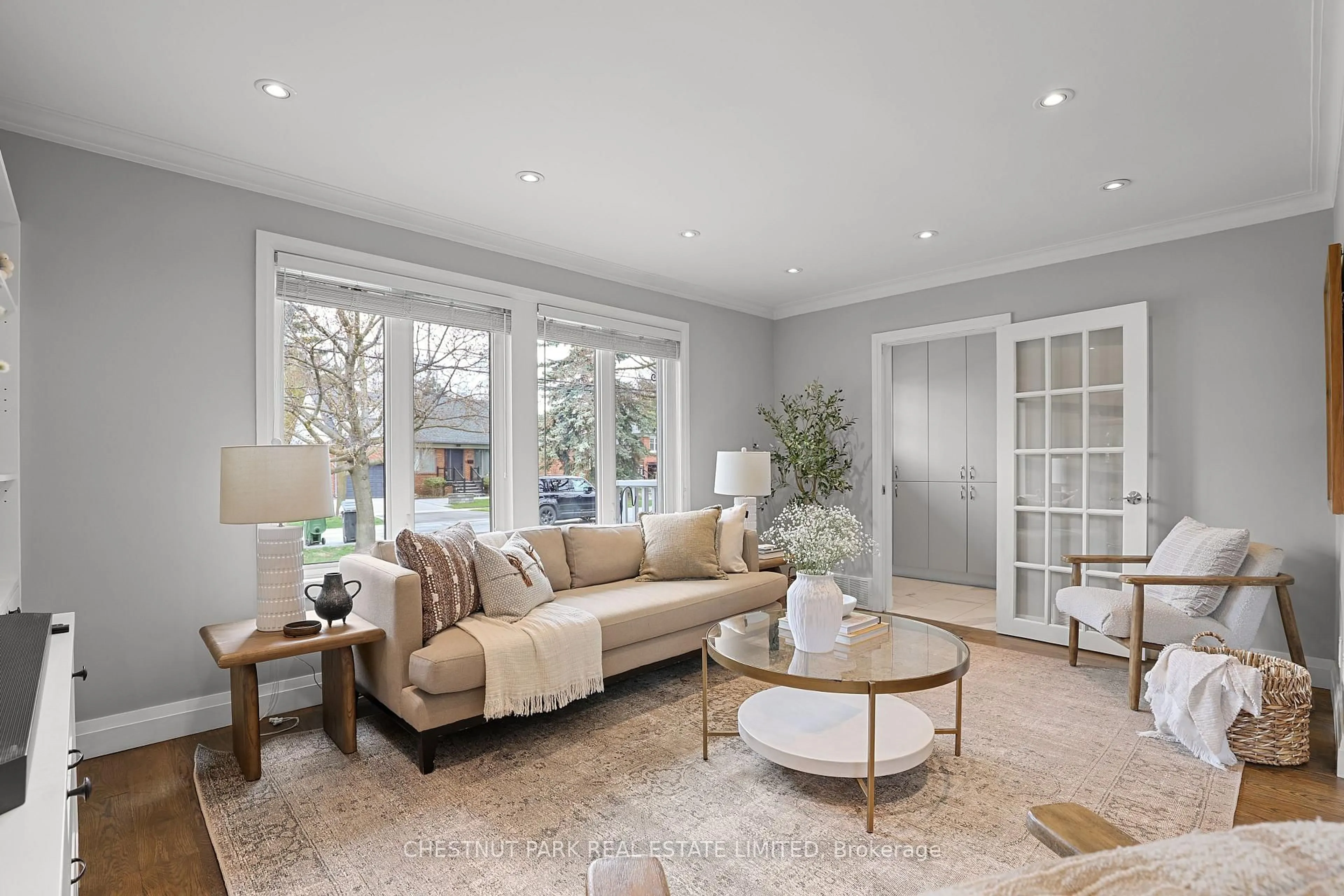 Living room with furniture, ceramic/tile floor for 27 Cedarcrest Dr, Toronto Ontario M9A 2V4