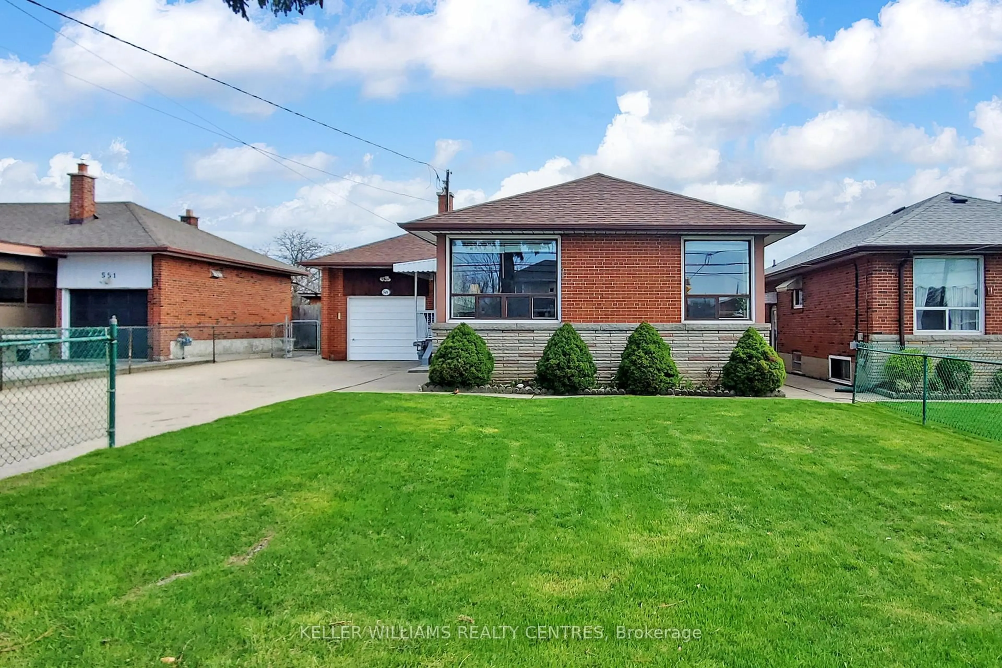 Home with brick exterior material, street for 549 Rustic Rd, Toronto Ontario M6L 1X8