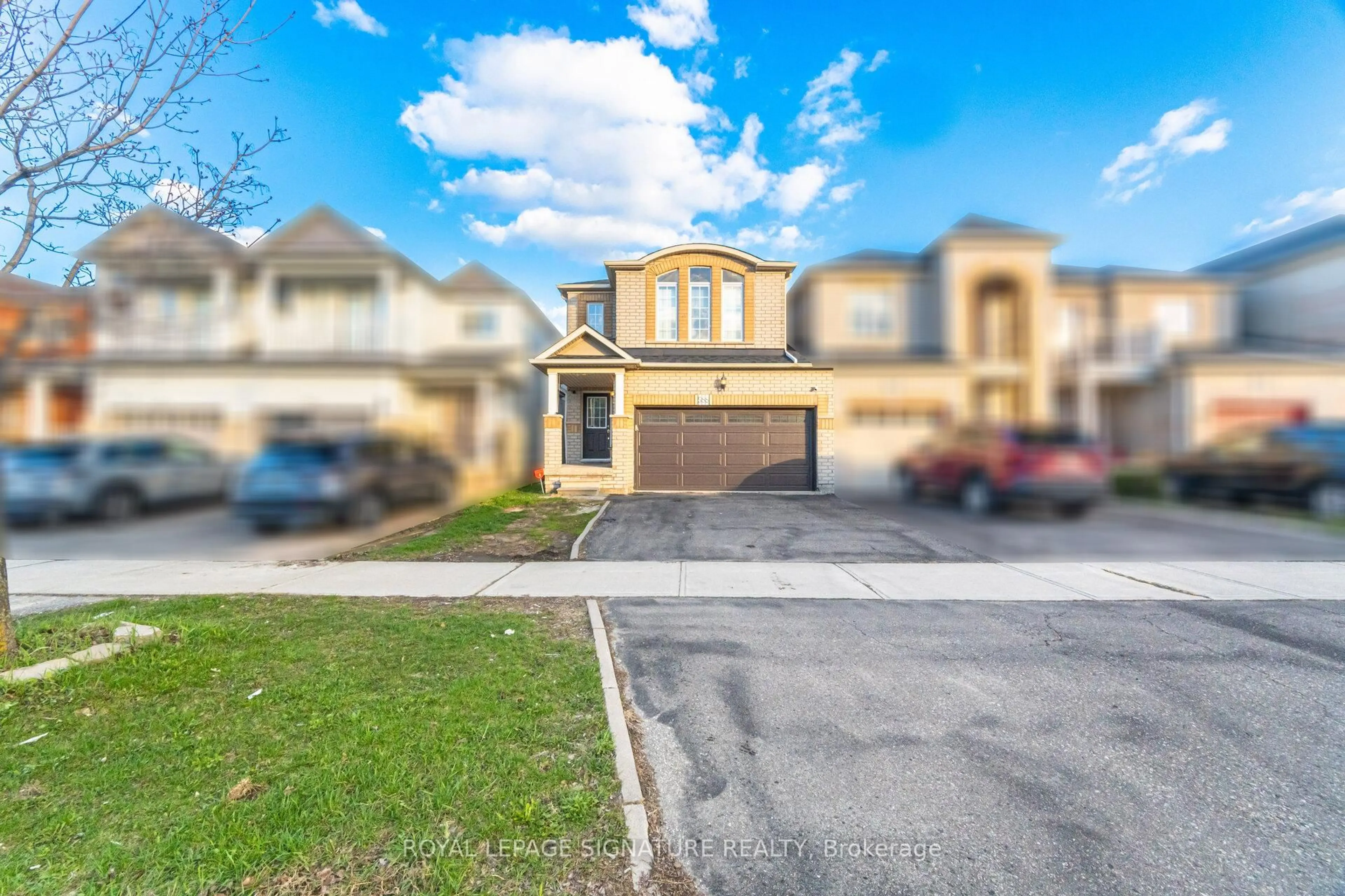 A pic from outside/outdoor area/front of a property/back of a property/a pic from drone, street for 588 Rossellini Dr, Mississauga Ontario L5W 1M4