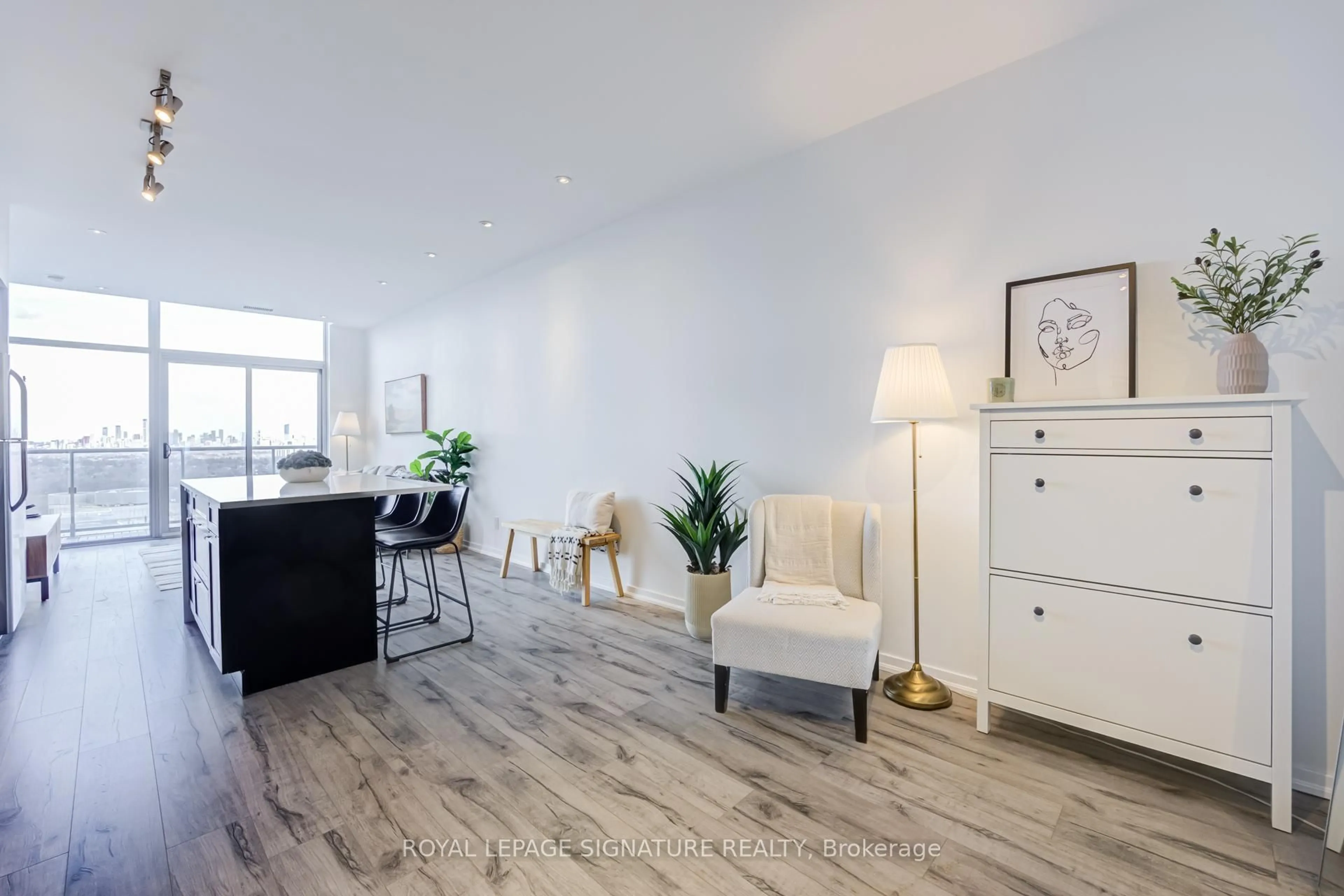 Living room with furniture, wood/laminate floor for 105 The Queensway #3513, Toronto Ontario M6S 5B5