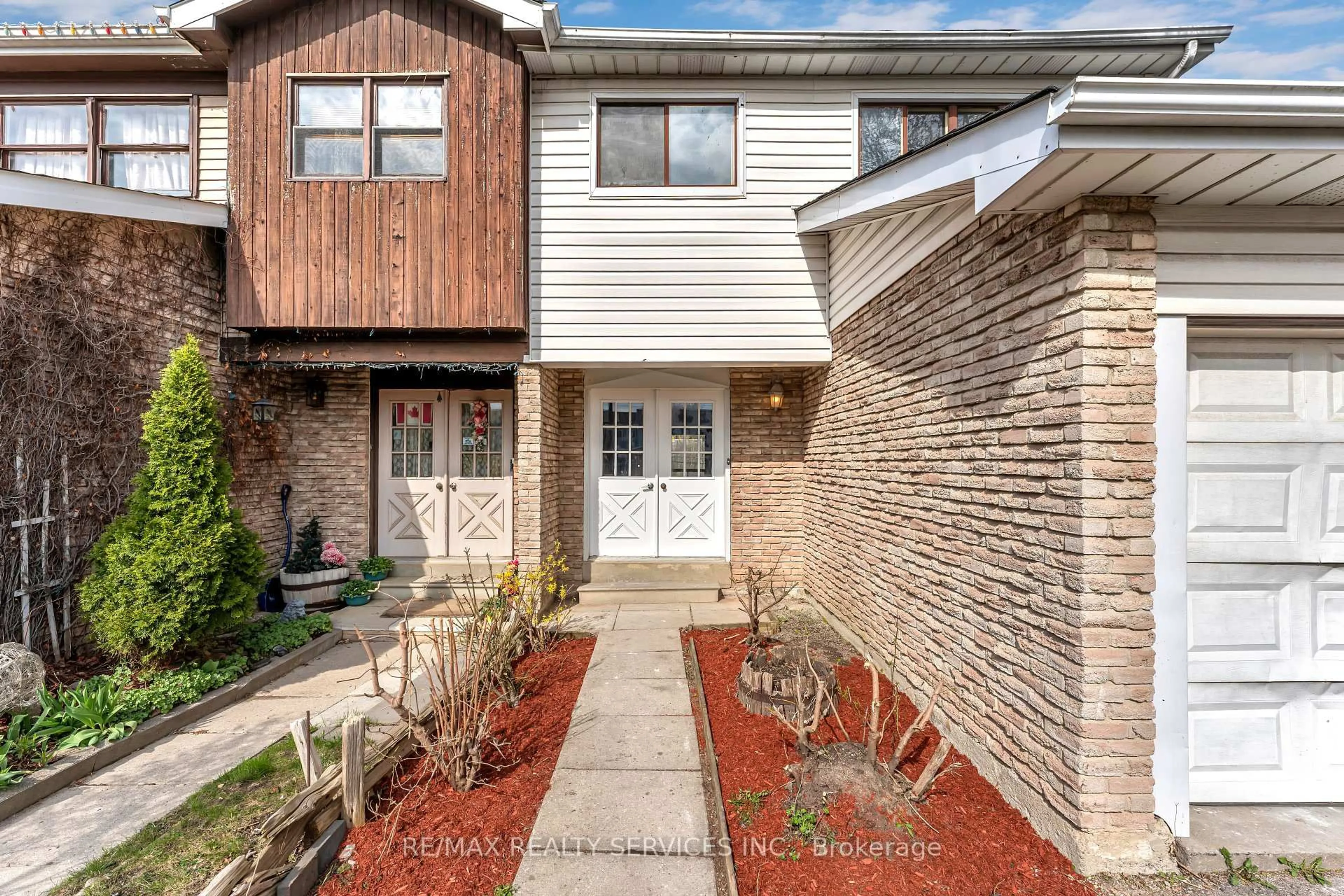 Home with brick exterior material, street for 54 Greene Dr, Brampton Ontario L6V 2R7