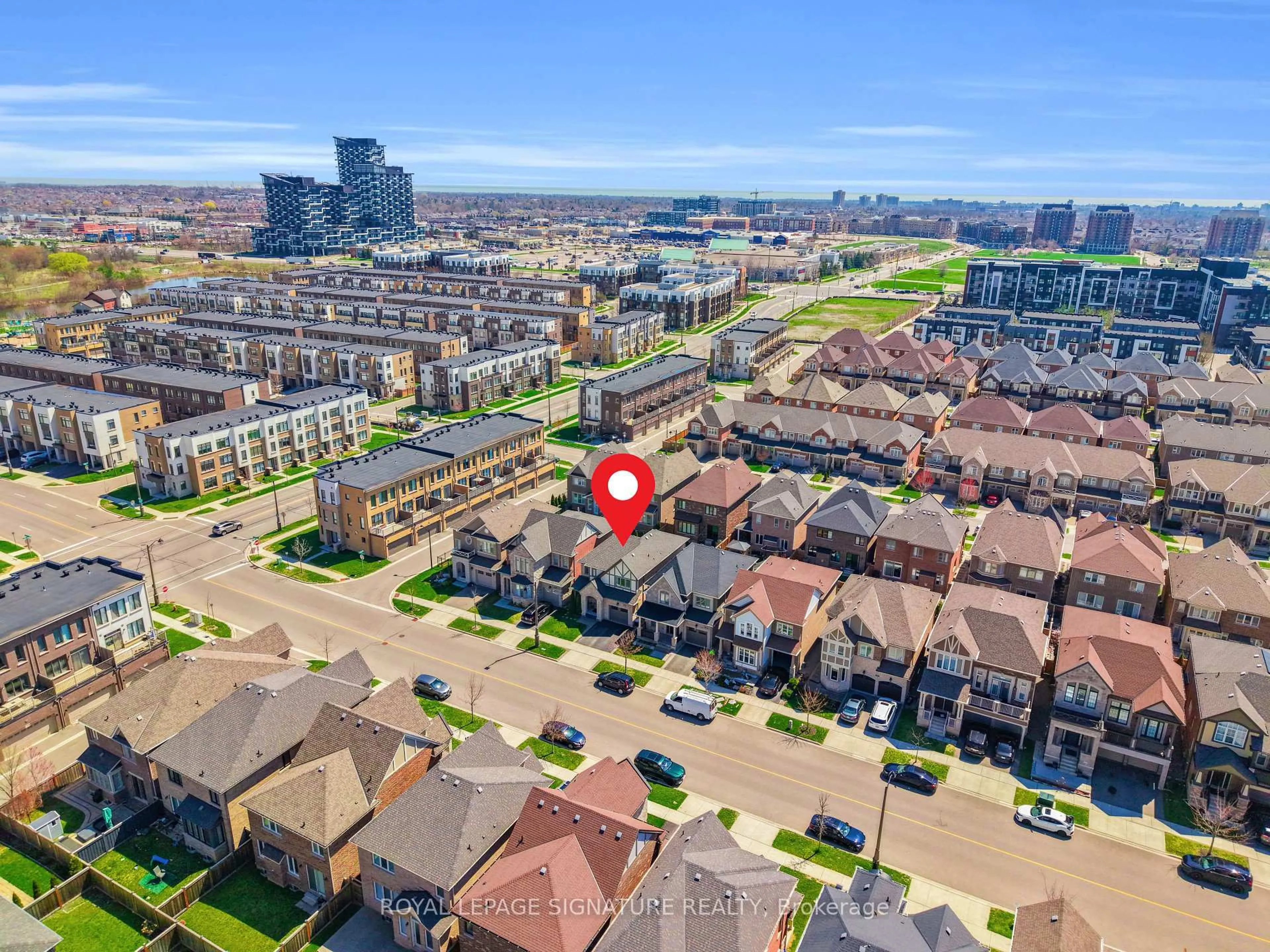 A pic from outside/outdoor area/front of a property/back of a property/a pic from drone, city buildings view from balcony for 164 Wheat Boom Dr, Oakville Ontario L6H 7C3