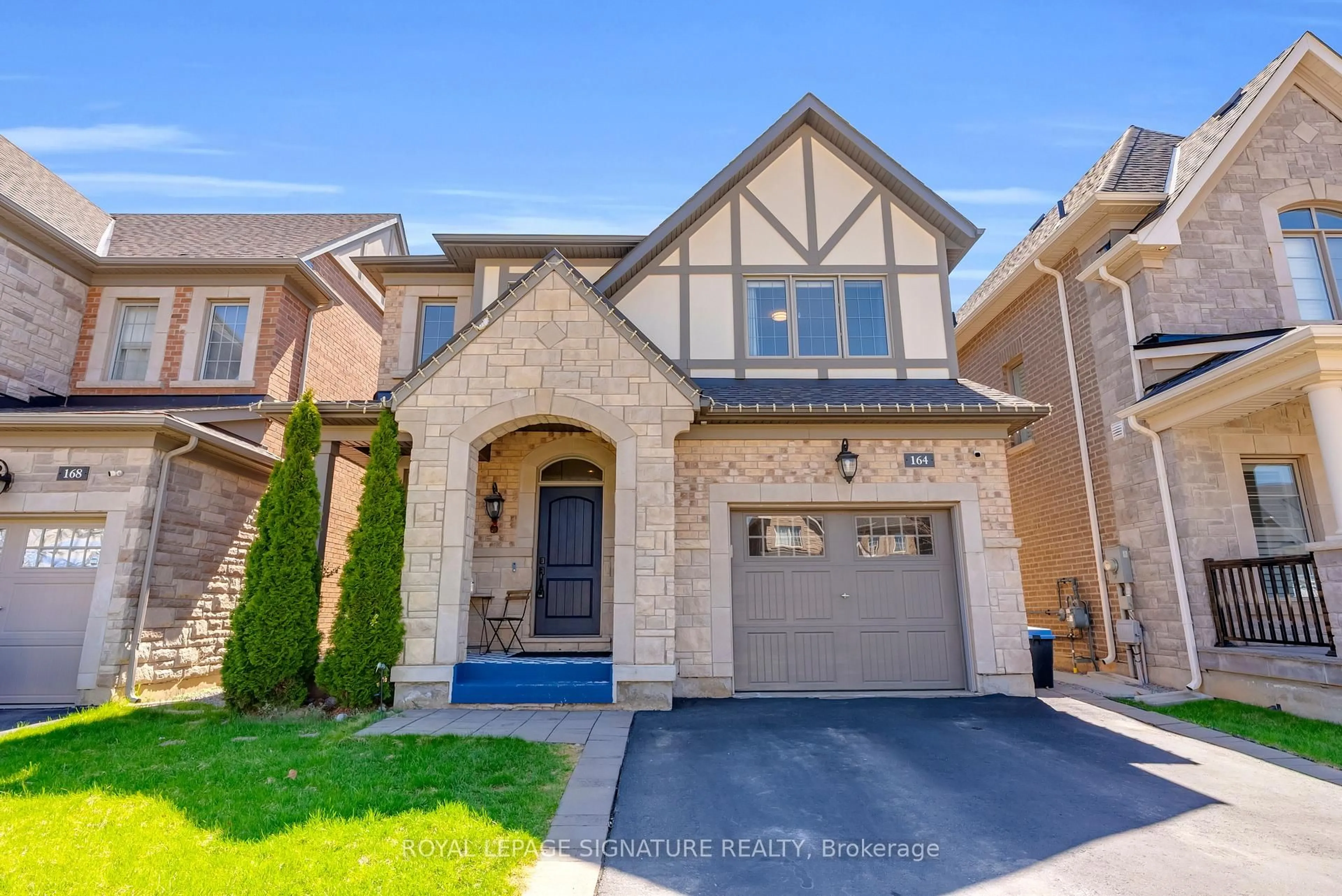 Home with brick exterior material, street for 164 Wheat Boom Dr, Oakville Ontario L6H 7C3