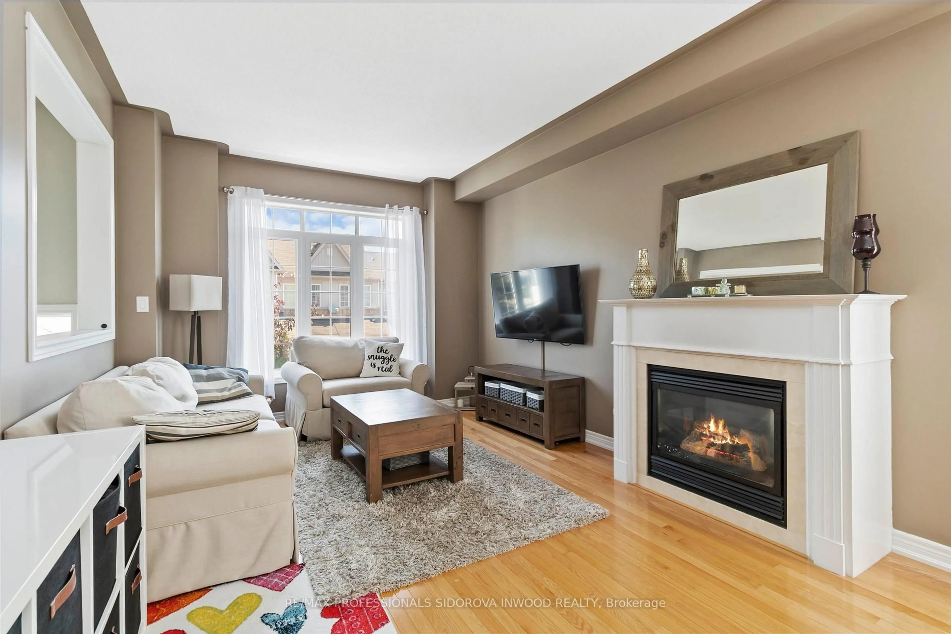 Living room with furniture, unknown for 43 Sutcliff Lane, Halton Hills Ontario L7G 0C2