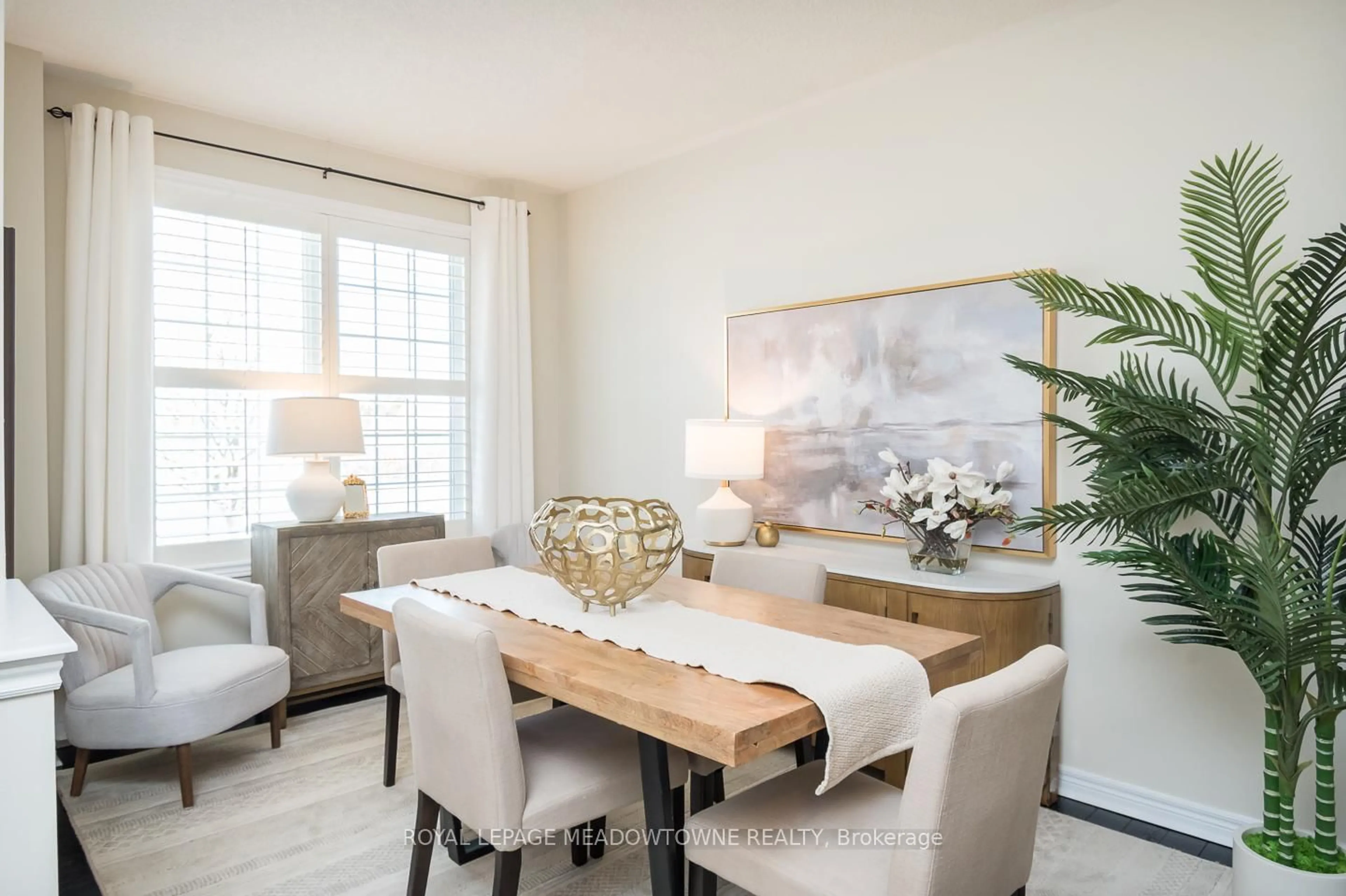 Dining room, wood/laminate floor for 496 Savoline Blvd, Milton Ontario L9T 7X3