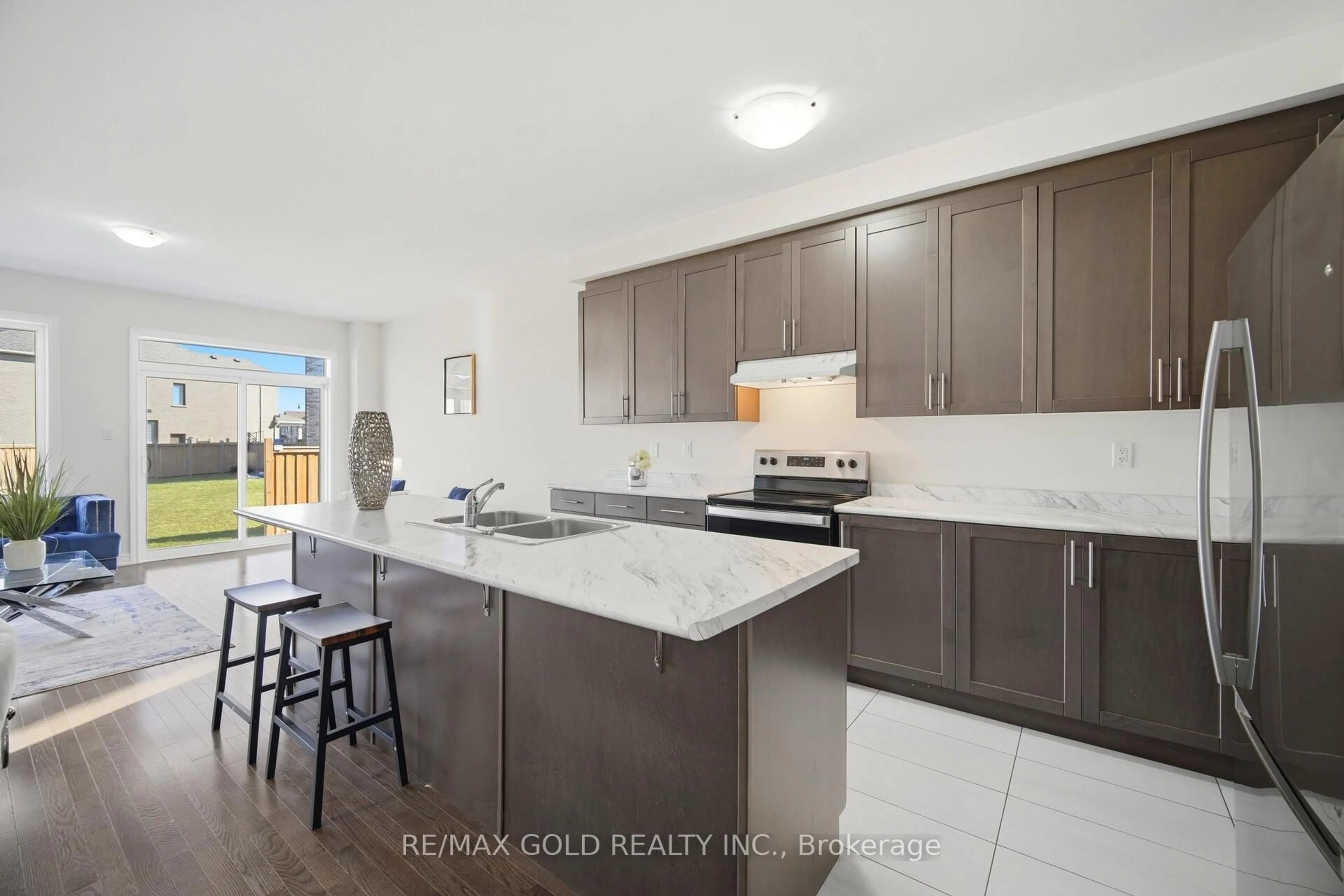 Open concept kitchen, ceramic/tile floor for 145 Adventura Rd, Brampton Ontario L7A 5A7